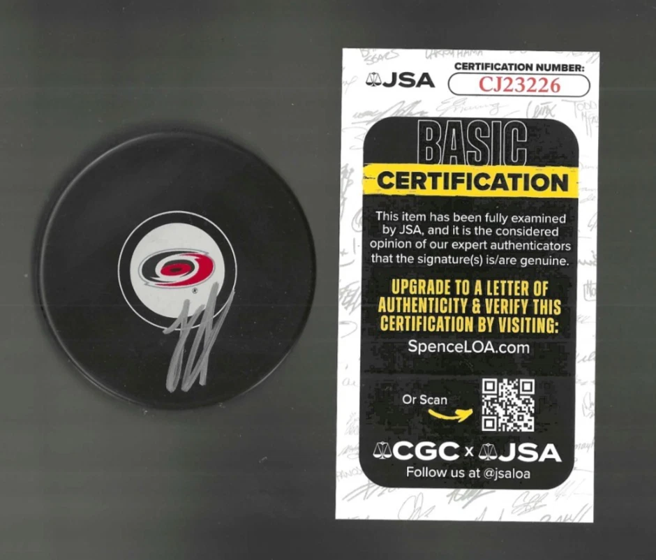 Logan Stankhoven Signed Carolina Hurricanes Puck JSA COA