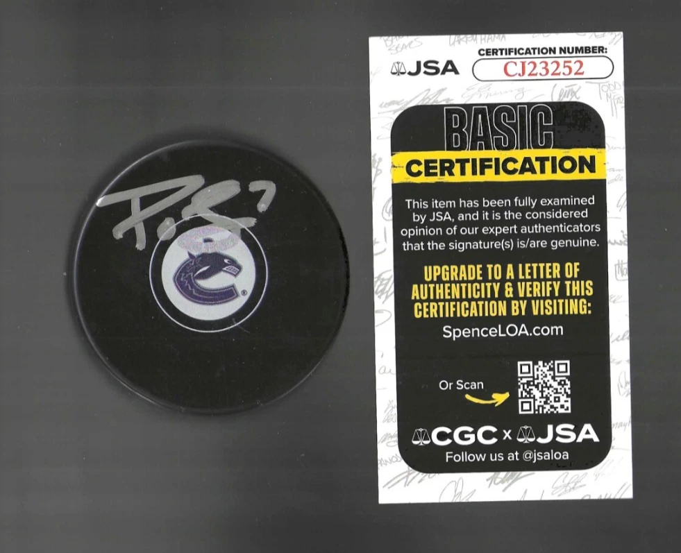 P.O. Joseph Signed Vancouver Canucks Puck JSA COA
