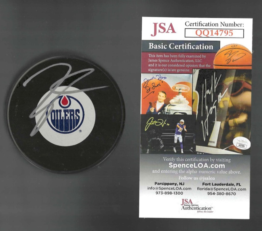 Taylor Hall Signed Edmonton Oilers Large Logo Puck Signed In Silver JSA COA