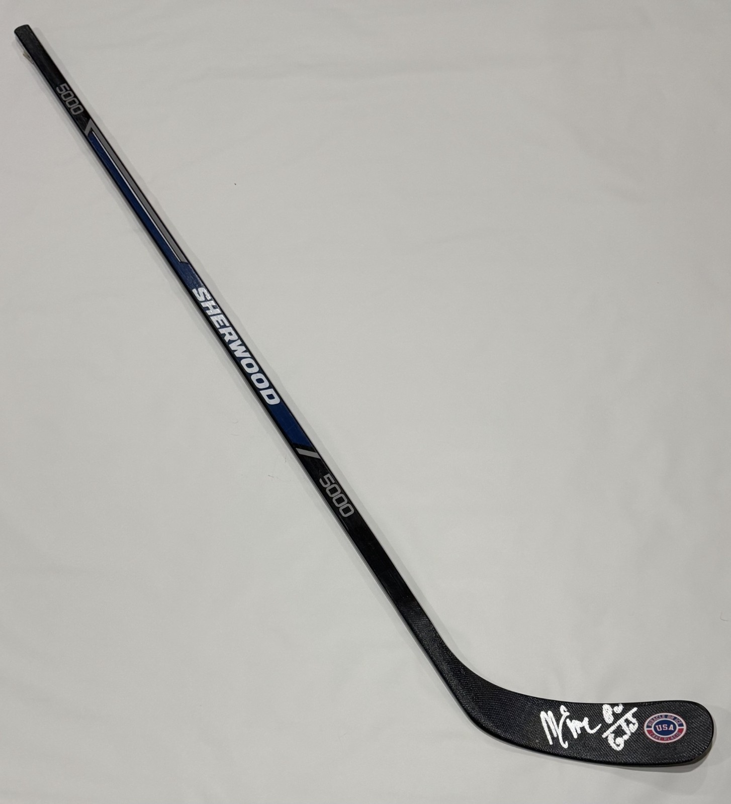 MIKE ERUZIONE SIGNED FULL SIZE HOCKEY STICK TEAM USA MIRACLE 1980 GOLD JSA COA