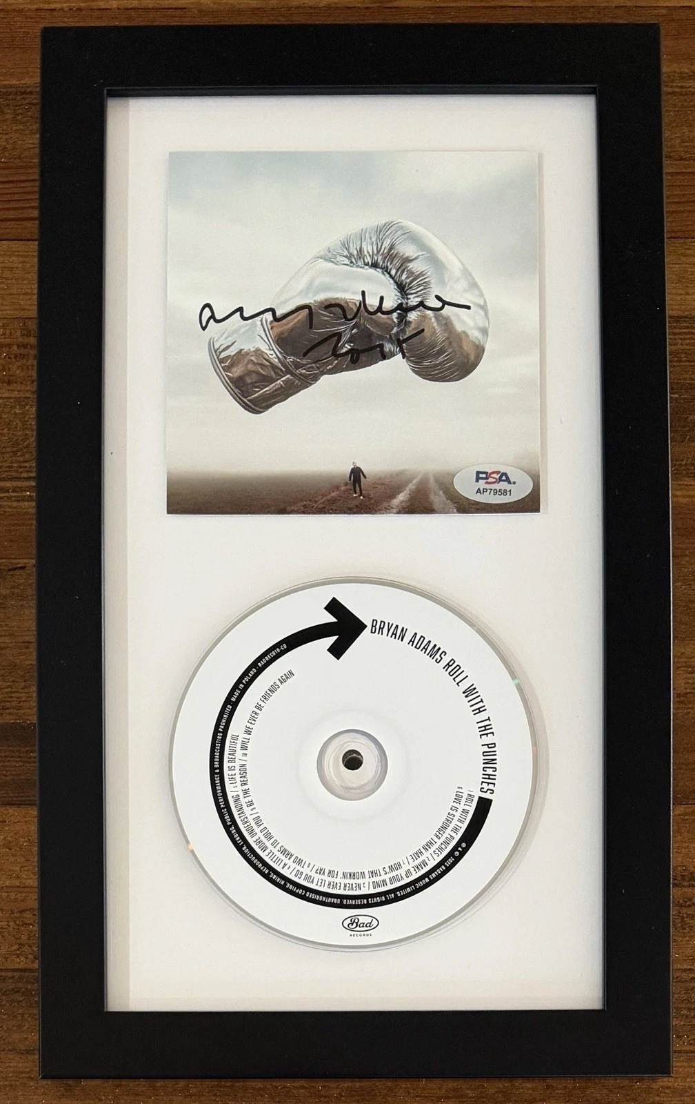 FRAMED BRYAN ADAMS ROLL WITH THE PUNCHES SIGNED COVER CARD & CD PSA DNA COA AUTO