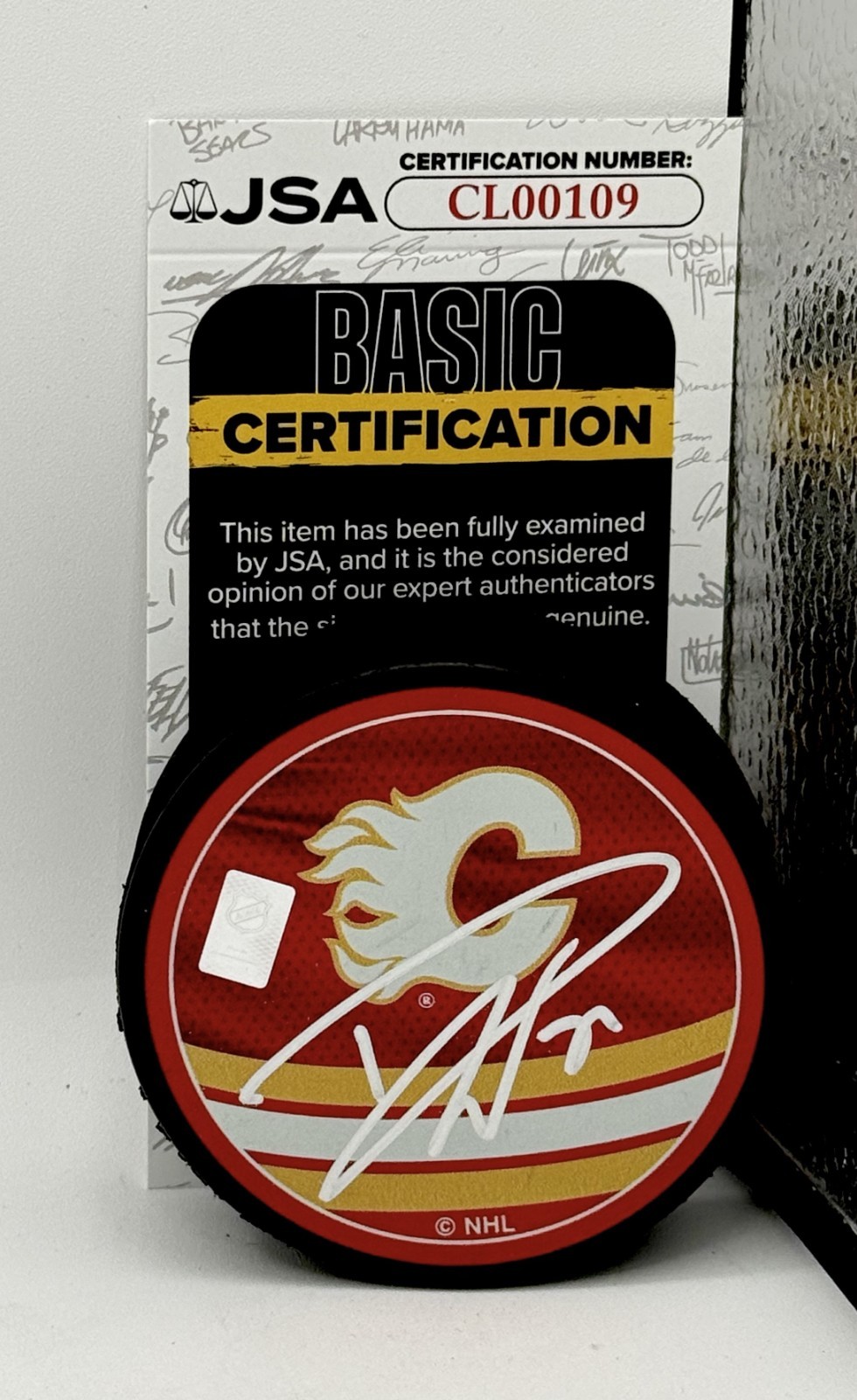 Dustin Wolf signed Calgary Flames Reverse Retro Puck autographed #2 JSA