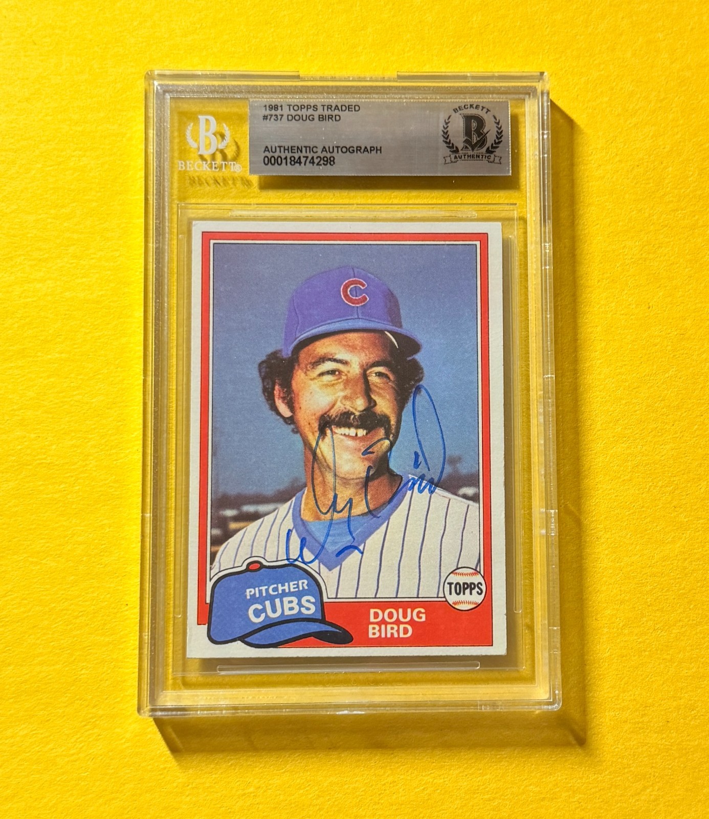 1981 TOPPS TRADED DOUG BIRD #737 SIGNED AUTO CARD BECKETT AUTHENTIC CUBS