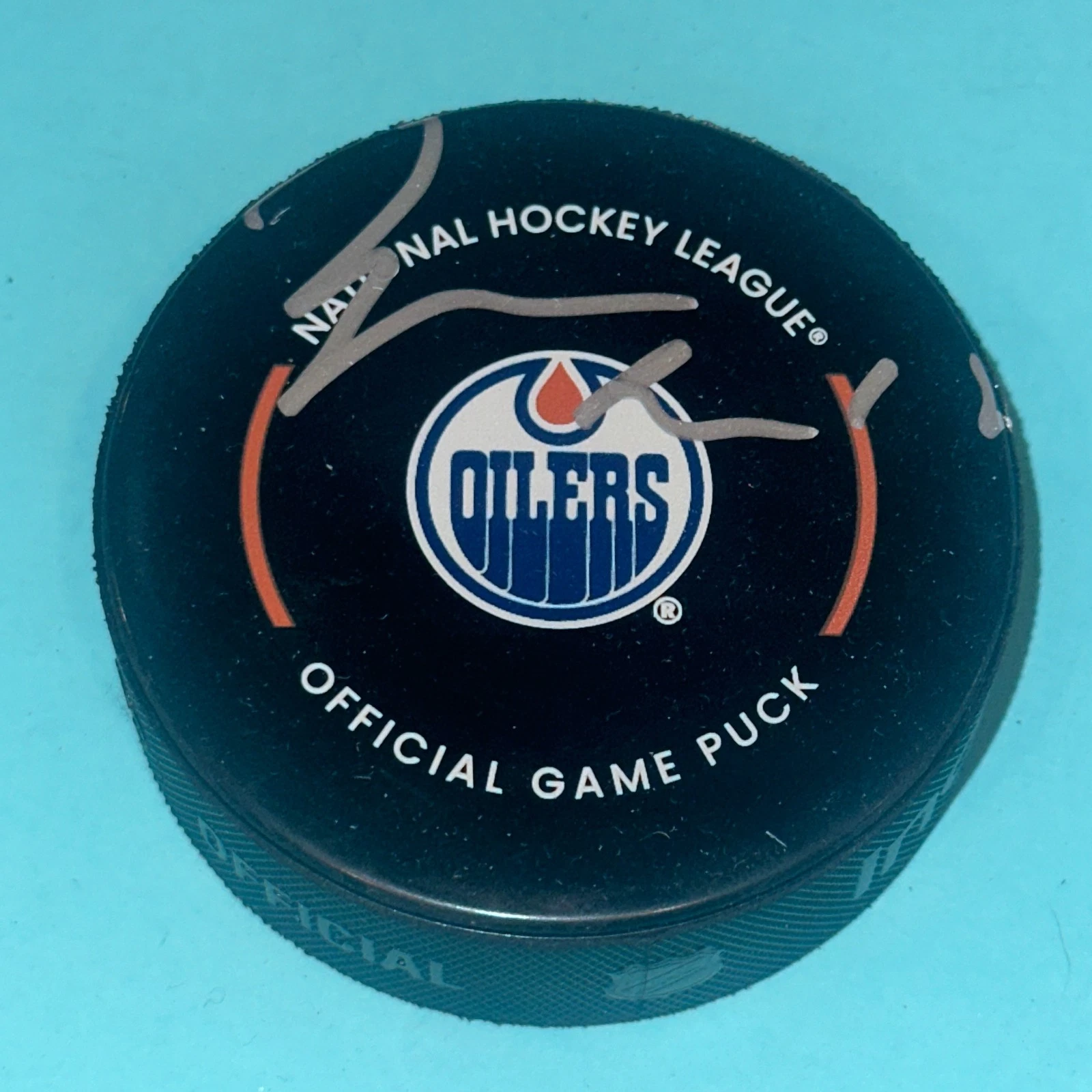 ZACH HYMAN Signed Edmonton OILERS Official GAME Puck Beckett (BAS)