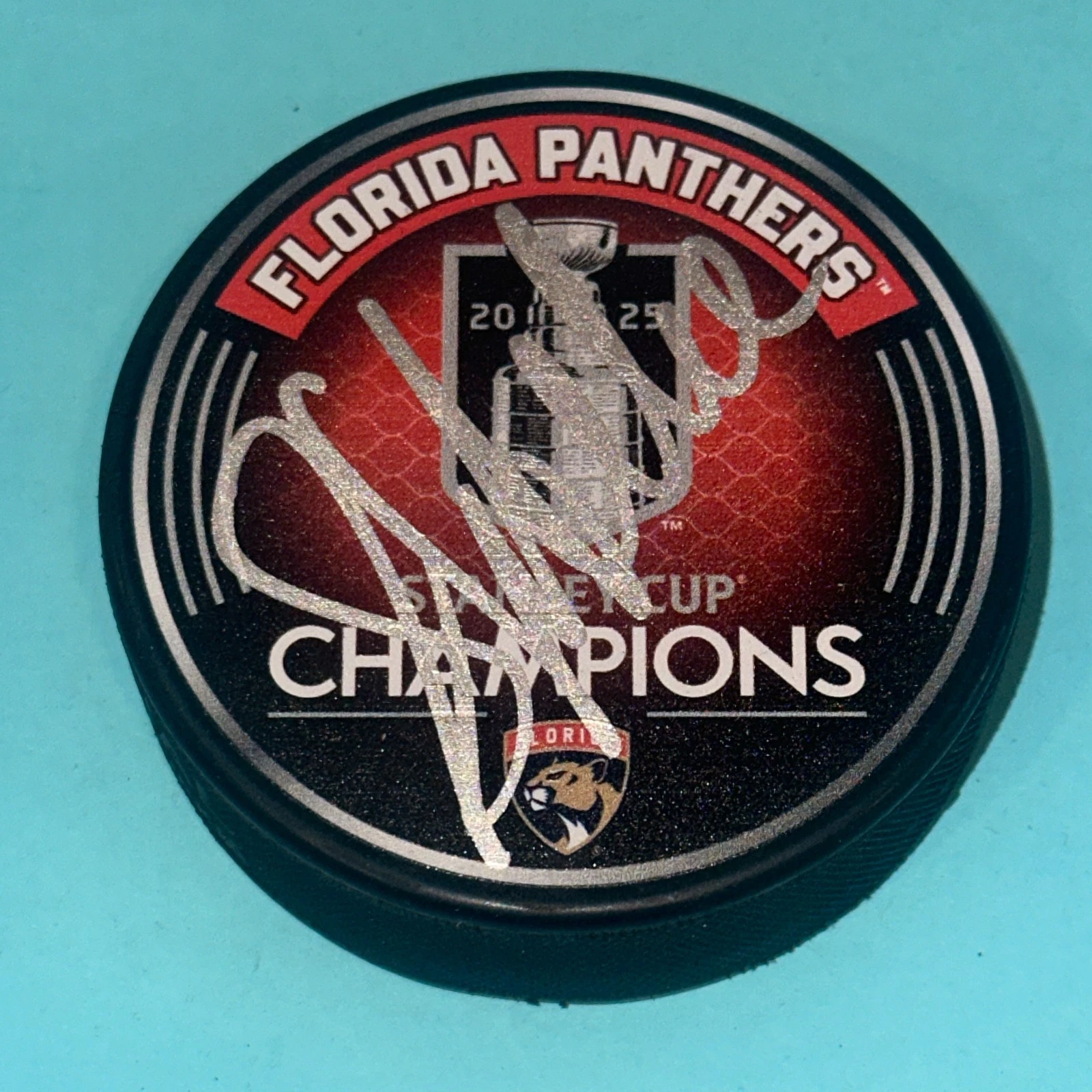 SYLVAIN LEFEBVRE (Panthers)  Signed 2025 STANLEY CUP CHAMPS Puck Beckett (BAS)