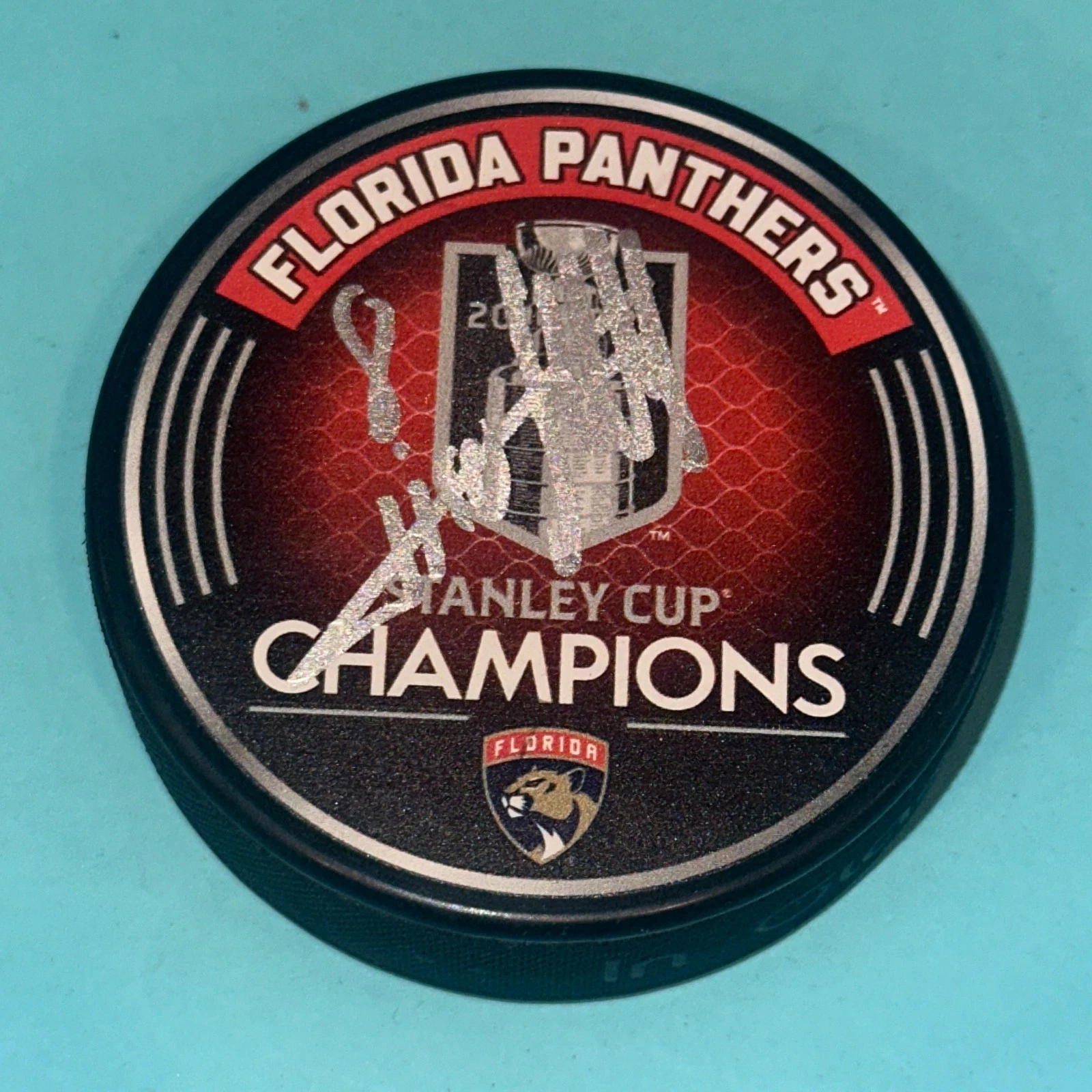 NICO STURM (Panthers)  Signed 2025 STANLEY CUP CHAMPS Puck Beckett (BAS)