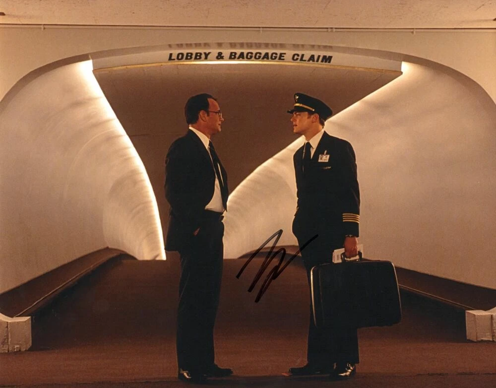 LEONARDO DICAPRIO SIGNED AUTOGRAPH 11×14 PHOTO CATCH ME IF YOU CAN W/ TOM HANKS COLLECTIBLE MEMORABILIA