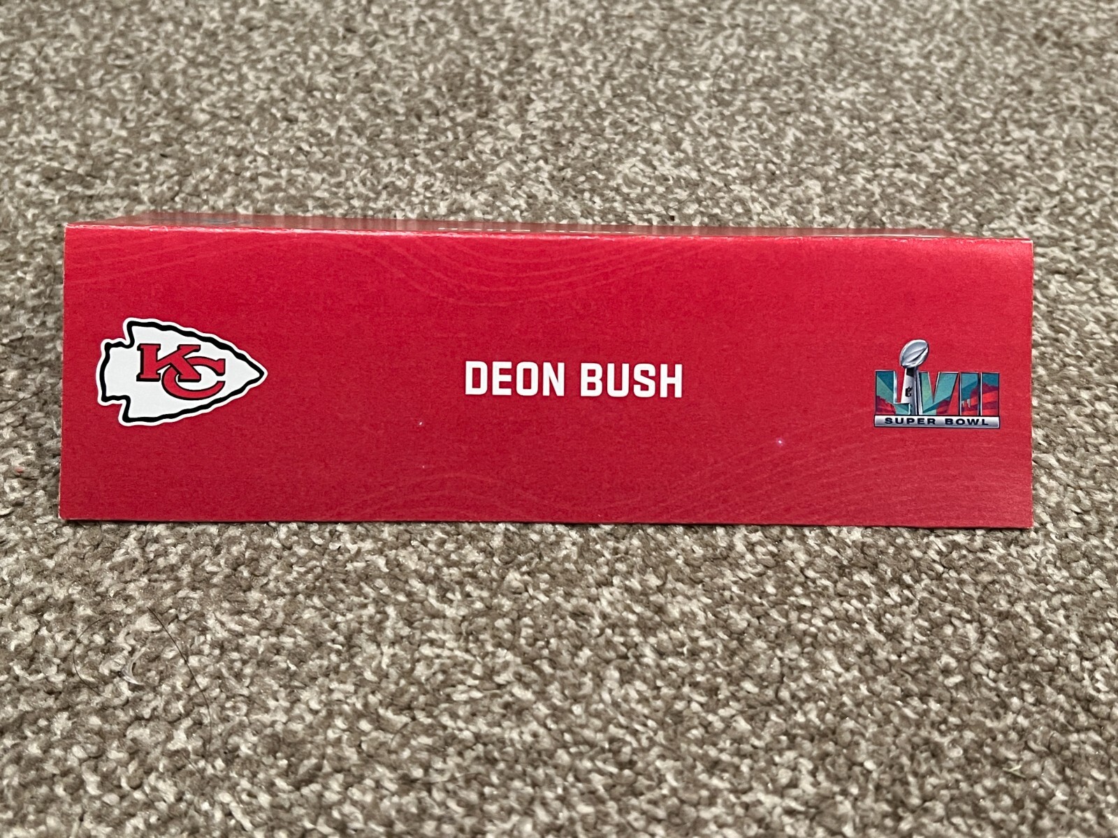 KANSAS CITY CHIEFS TEAM ISSUED SUPER BOWL LVII PAPER NAMEPLATE DEON BUSH