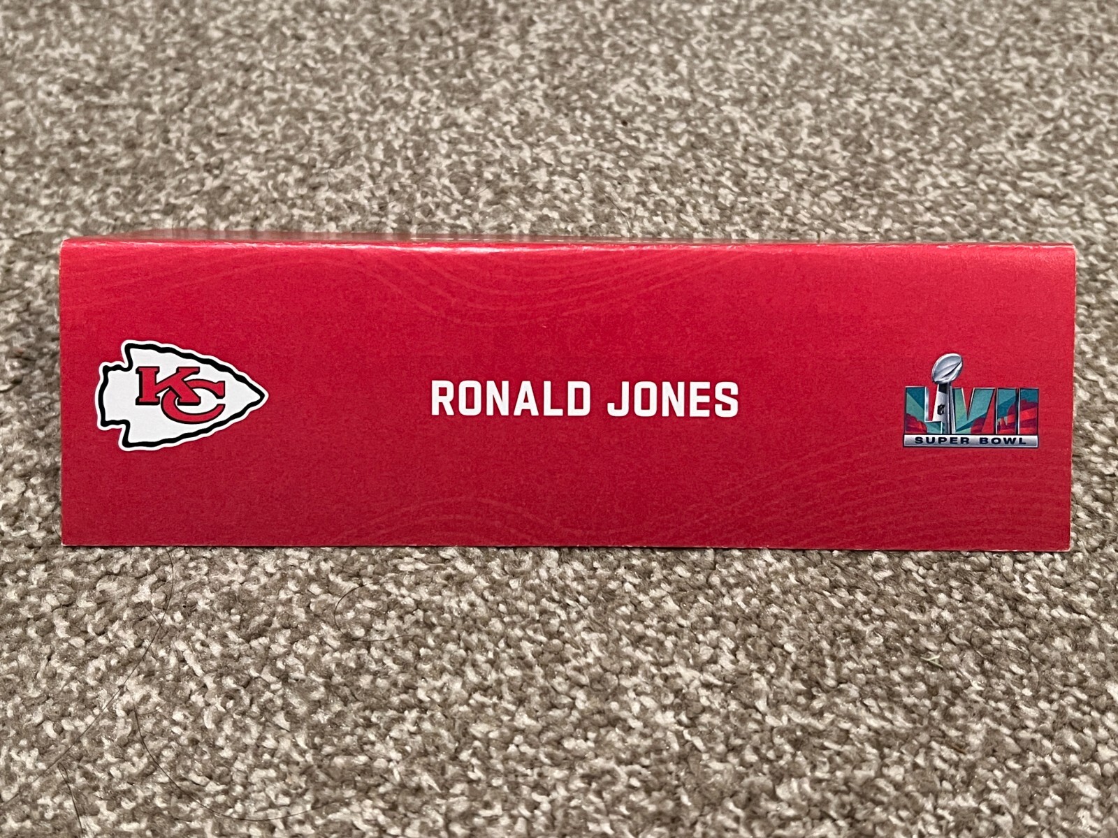KANSAS CITY CHIEFS TEAM ISSUED SUPER BOWL LVII PAPER NAMEPLATE RONALD JONES