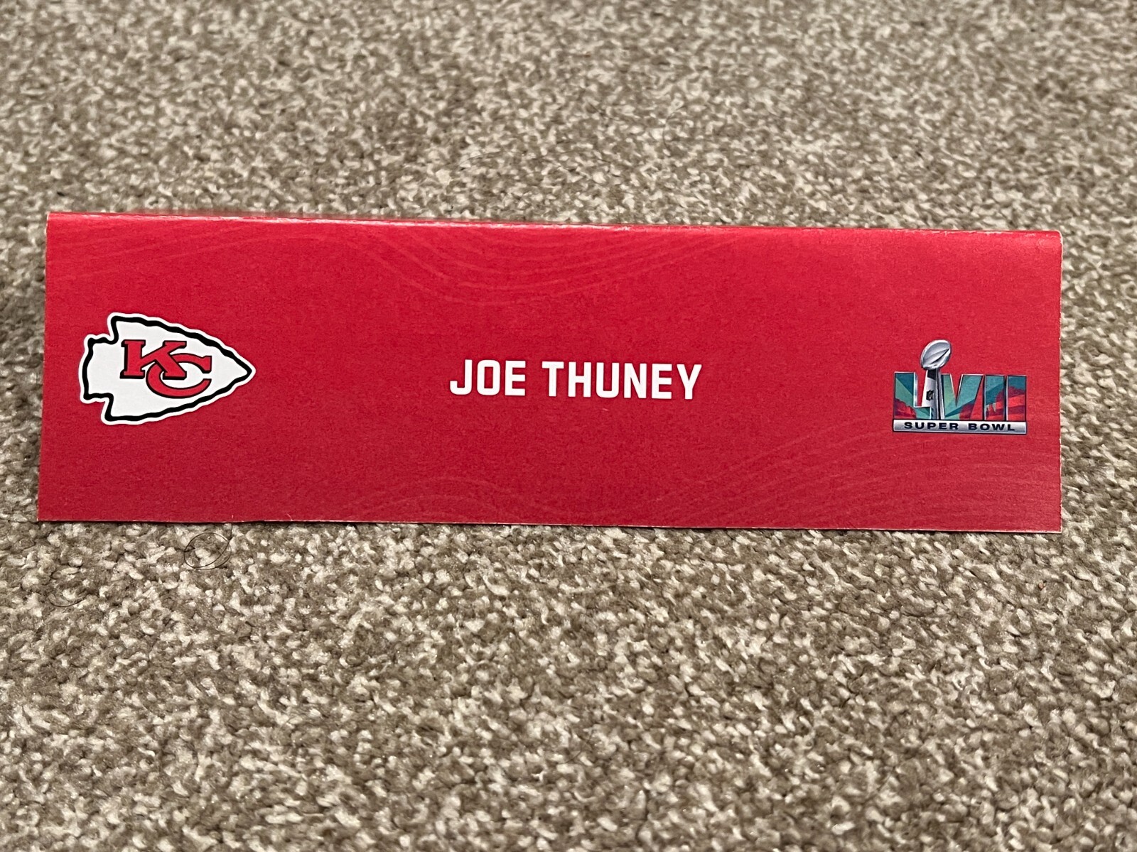 KANSAS CITY CHIEFS TEAM ISSUED SUPER BOWL LVII PAPER NAMEPLATE JOE THUNEY