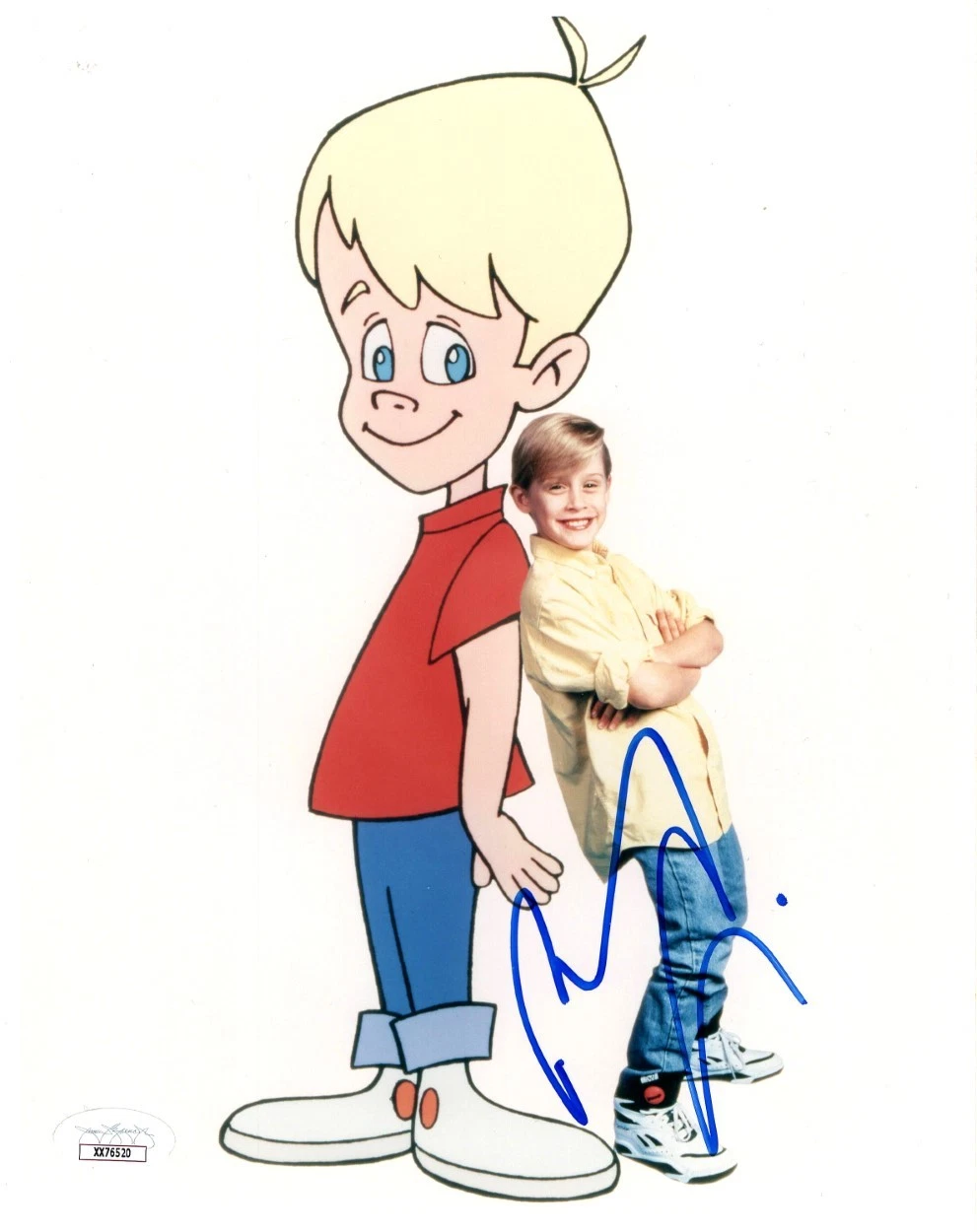 MACAULAY CULKIN SIGNED AUTOGRAPHED 8X10 PHOTO STANDING WITH CARTOON JSA XX76520 COLLECTIBLE MEMORABILIA