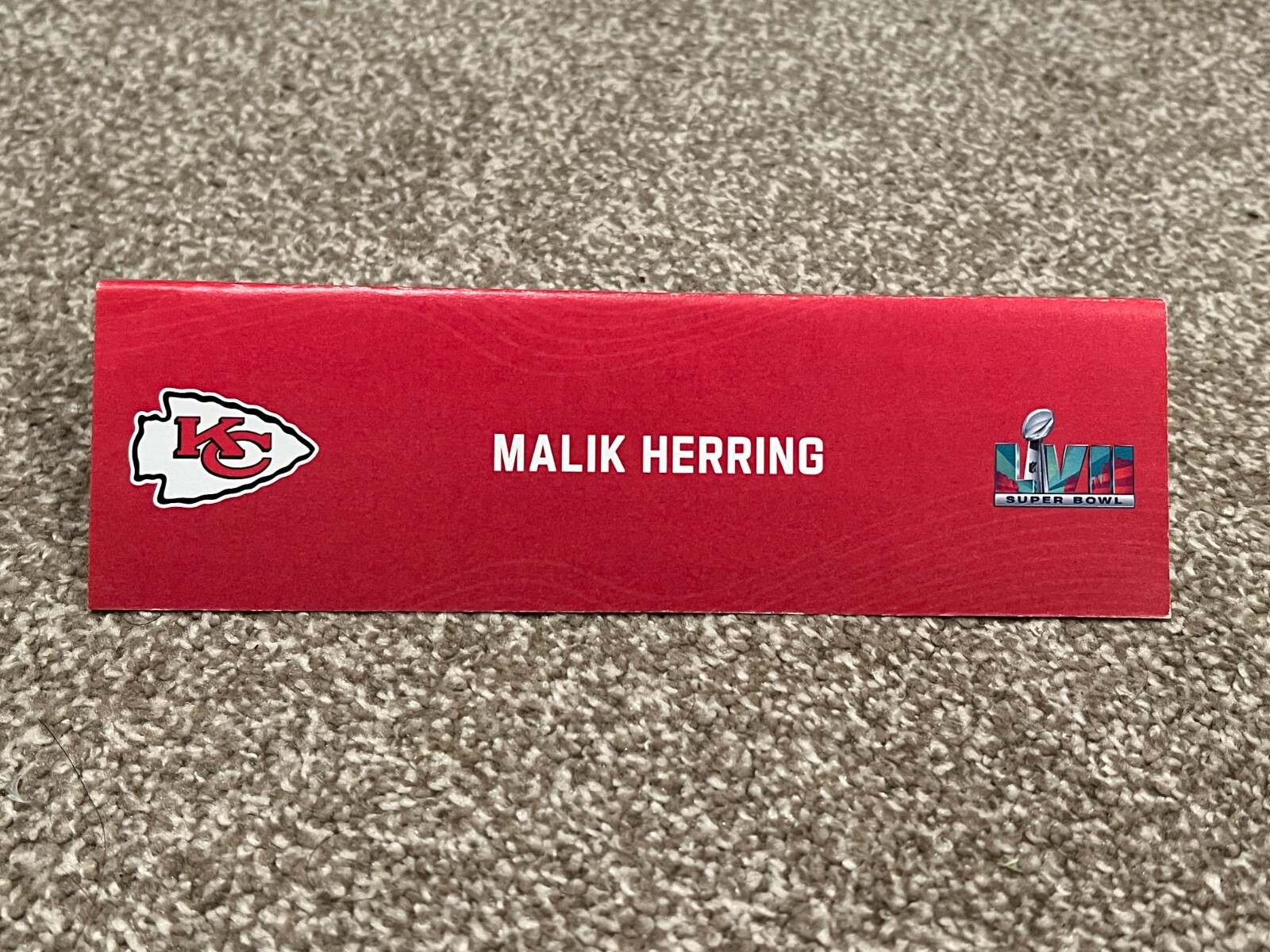 KANSAS CITY CHIEFS TEAM ISSUED SUPER BOWL LVII PAPER NAMEPLATE MALIK HERRING