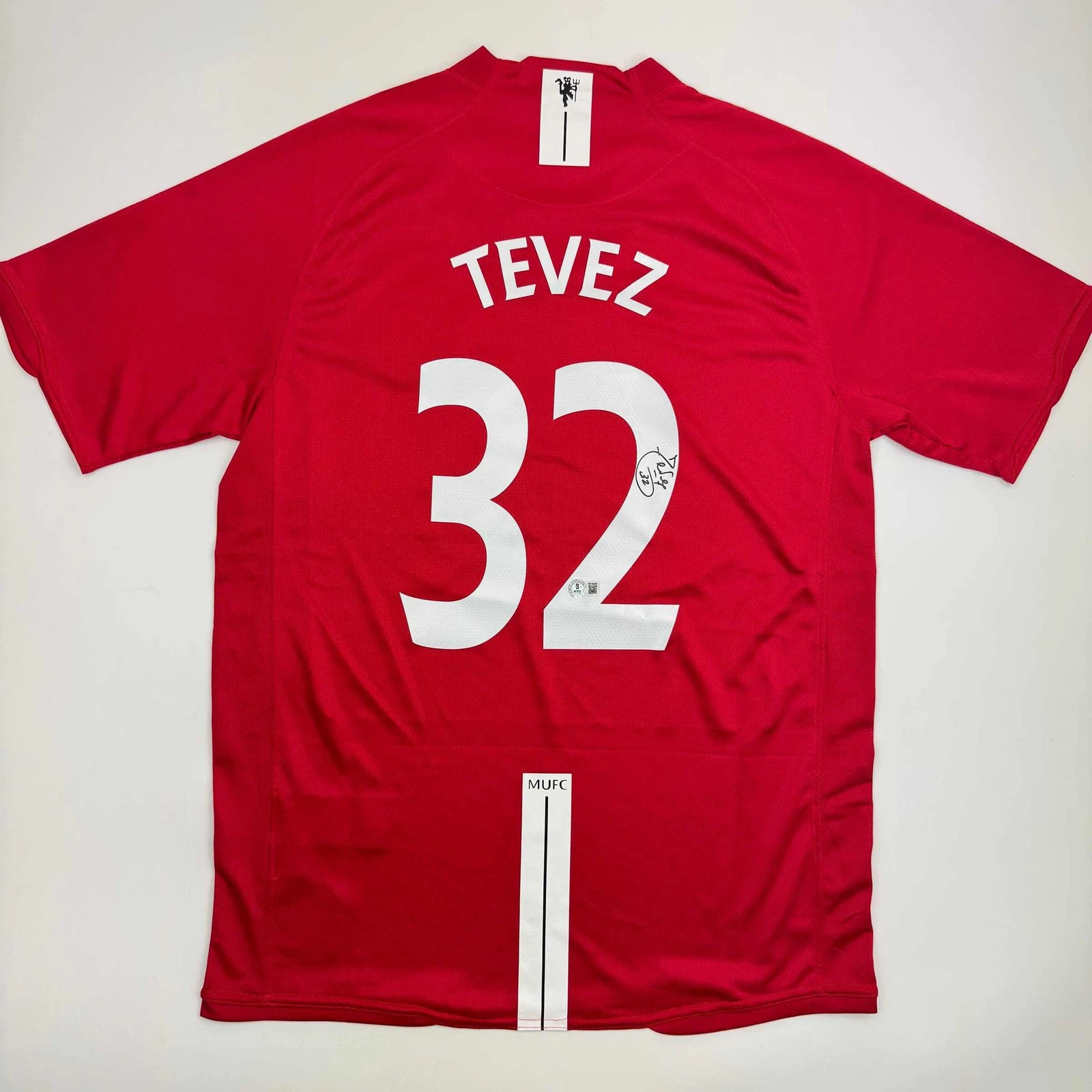 Autographed/Signed Carlos Tevez Manchester United Red Jersey Beckett BAS COA
