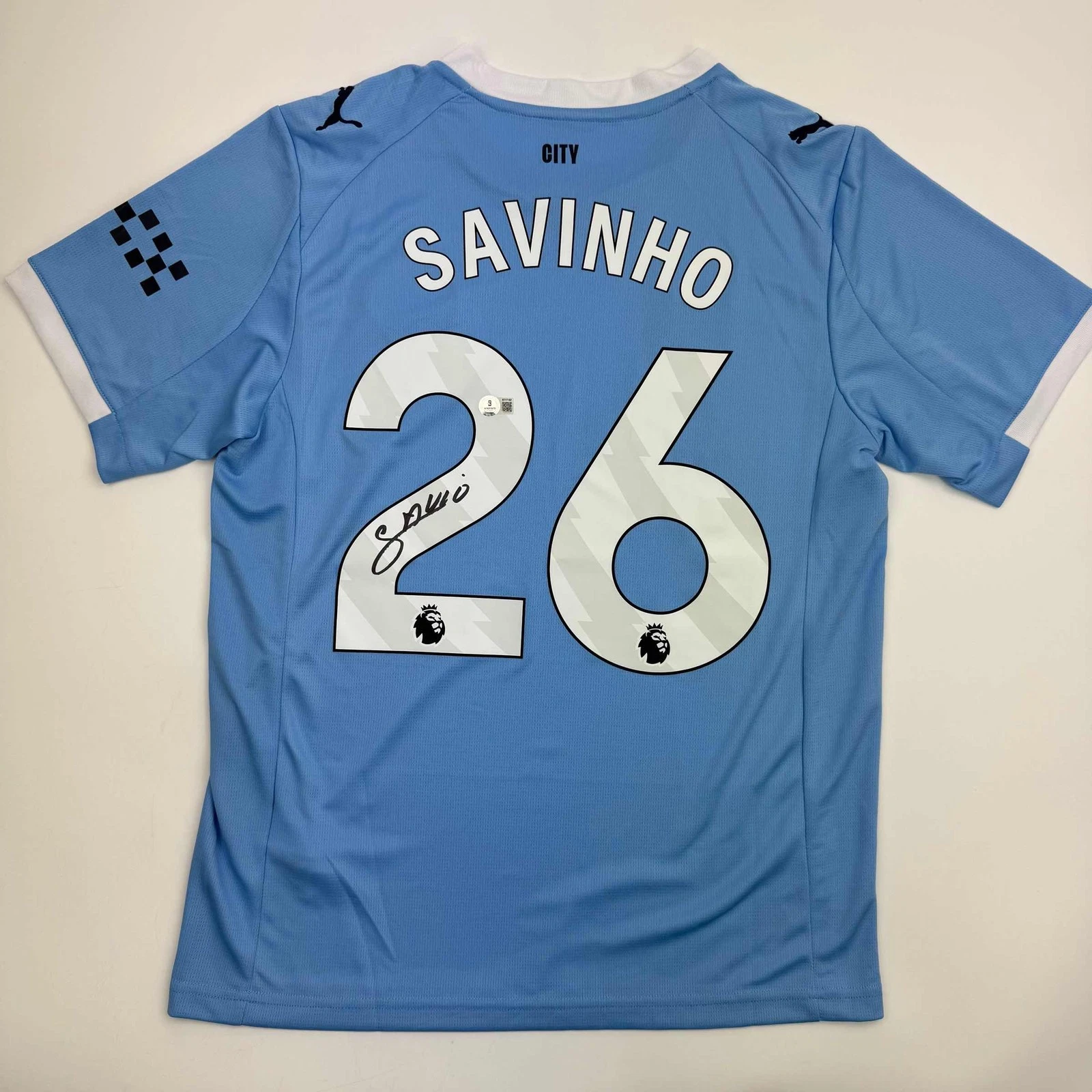 Autographed/Signed Savinho Manchester City Blue Soccer Jersey Beckett BAS COA