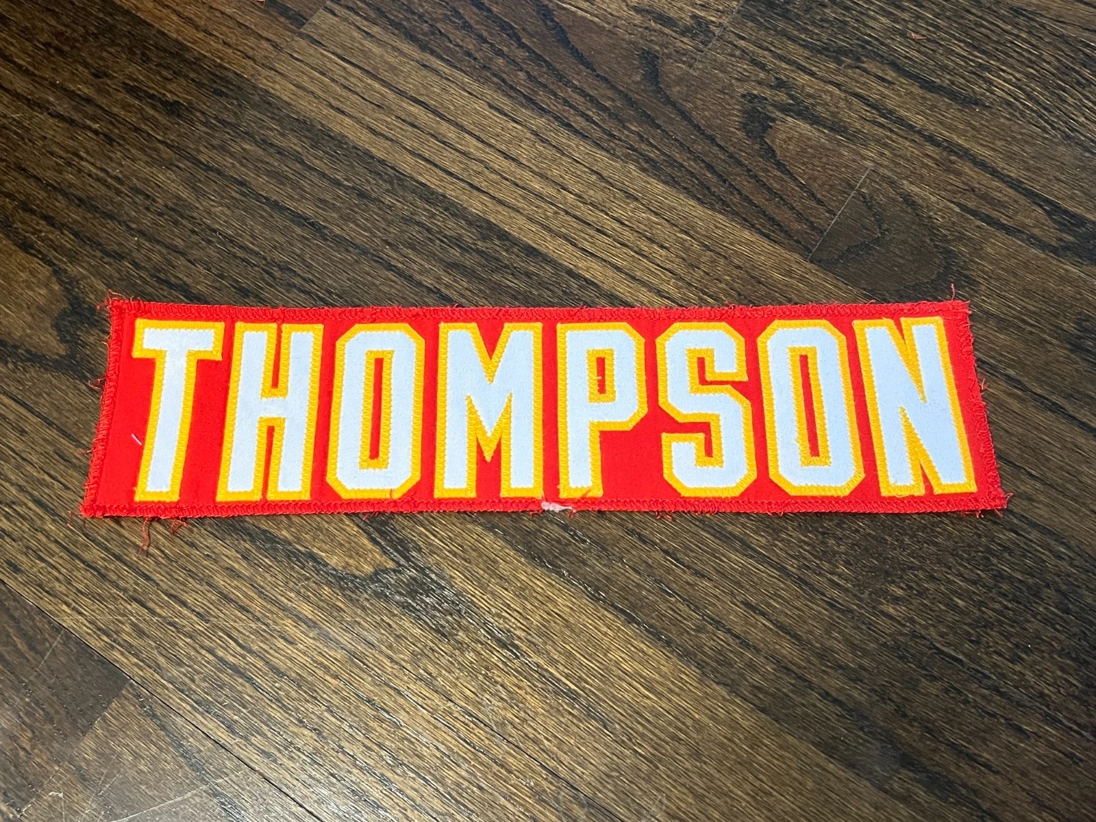 KANSAS CITY CHIEFS GAME USED ? ISSUED FOOTBALL JERSEY NAMEPLATE THOMPSON