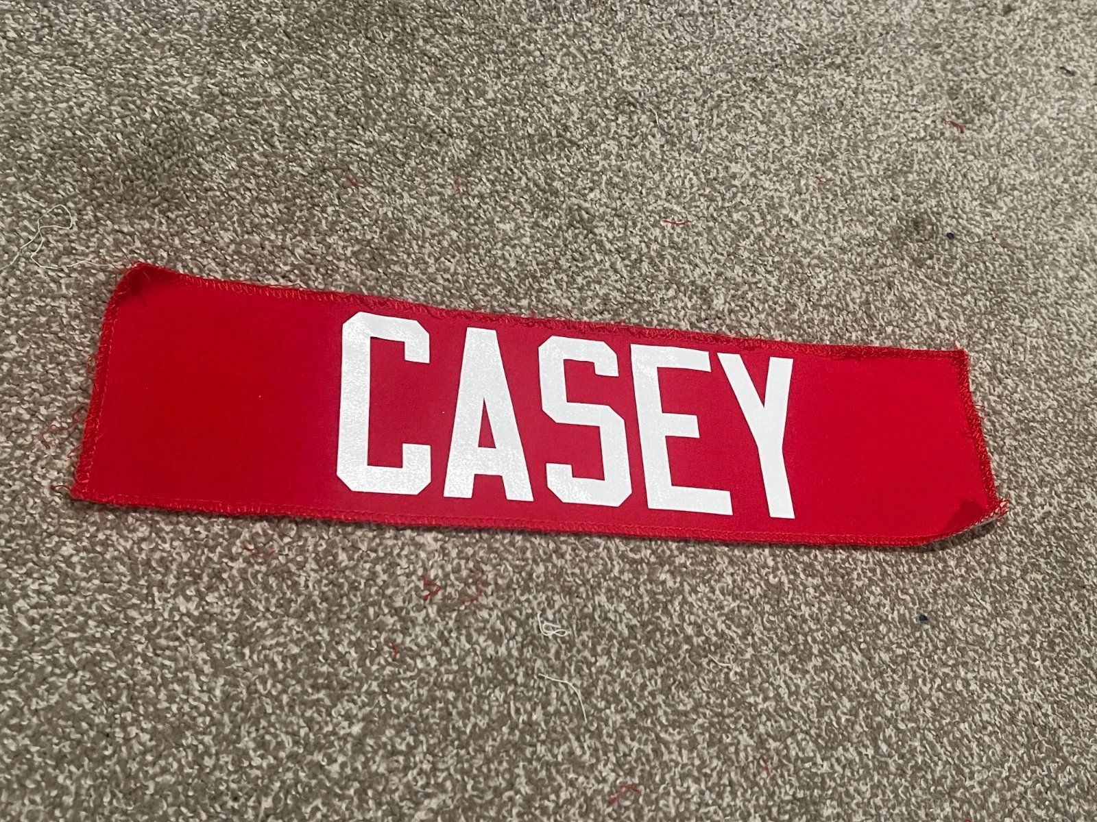 KANSAS CITY CHIEFS GAME USED ? TEAM ISSUED JERSEY NAMEPLATE JARED CASEY KU
