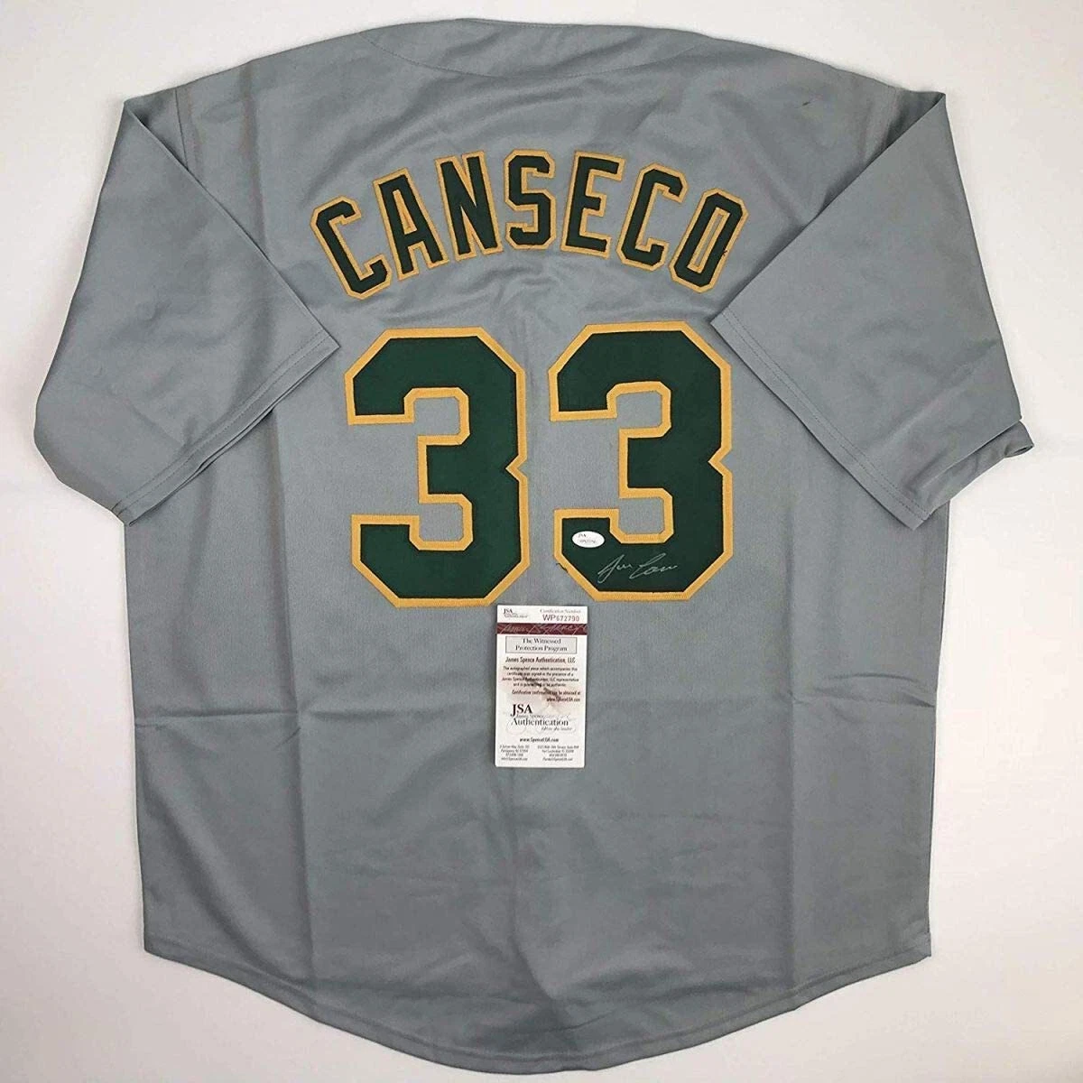 Autographed/Signed JOSE CANSECO Oakland Grey Baseball Jersey JSA COA Auto