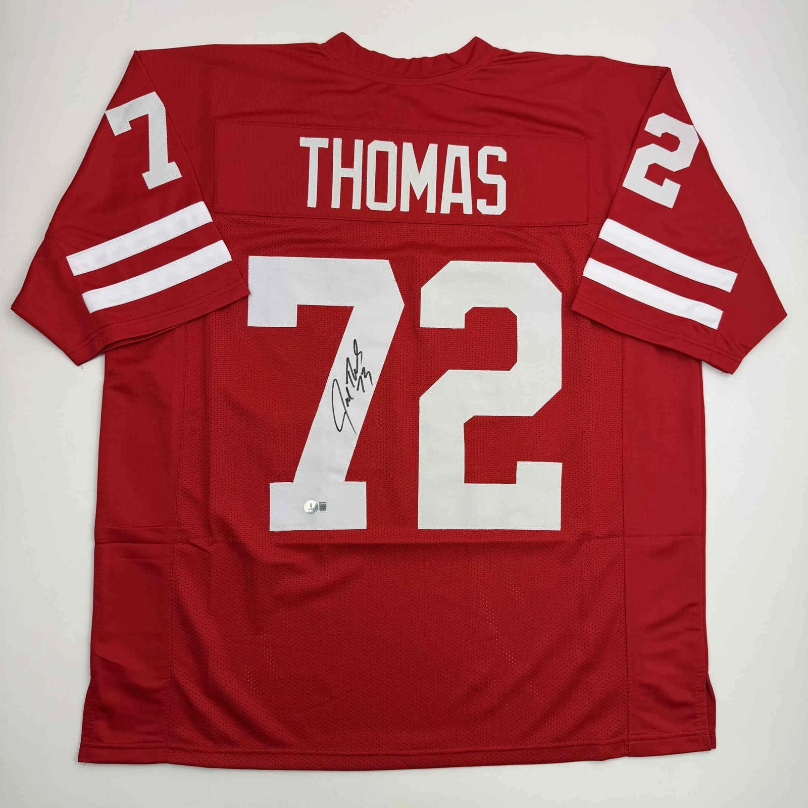 Autographed/Signed Joe Thomas Wisconsin Red College Jersey Beckett BAS COA