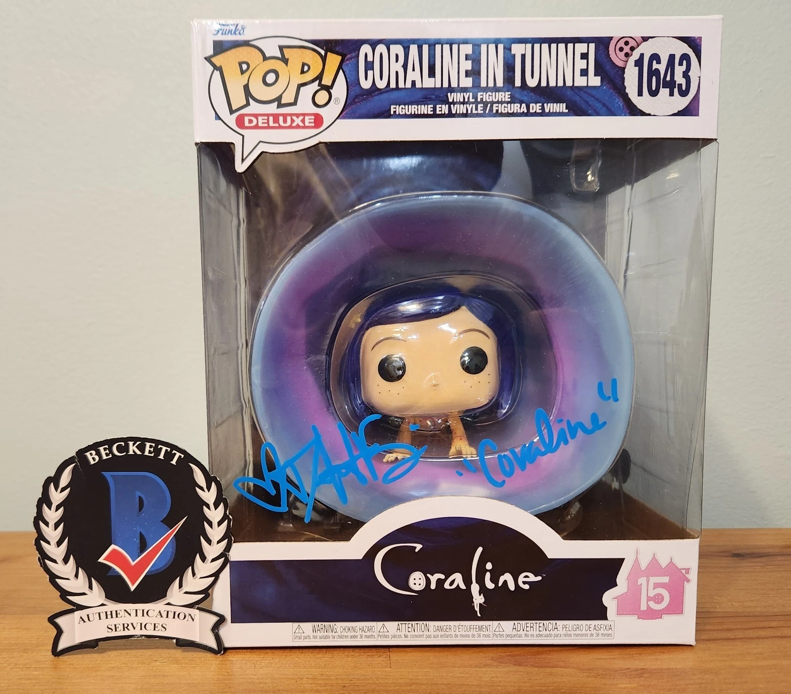 DAKOTA FANNING SIGNED CORALINE FUNKO POP IN TUNNEL WITH CHARACTER NAME BAS COA COLLECTIBLE MEMORABILIA