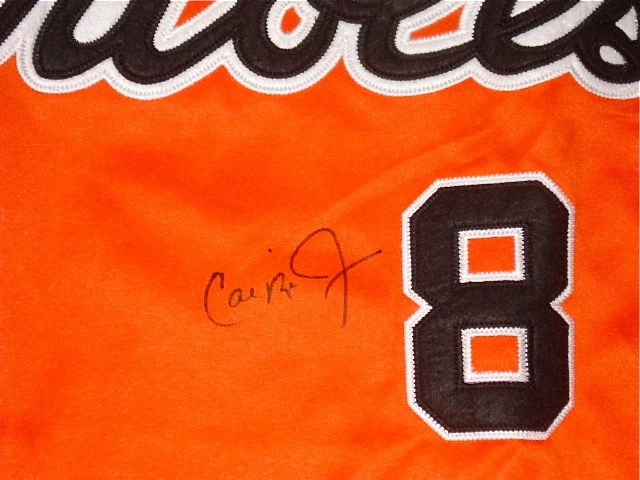 CAL RIPKEN JR AUTOGRAPHED JERSEY (ORIOLES) W/ PROOF!