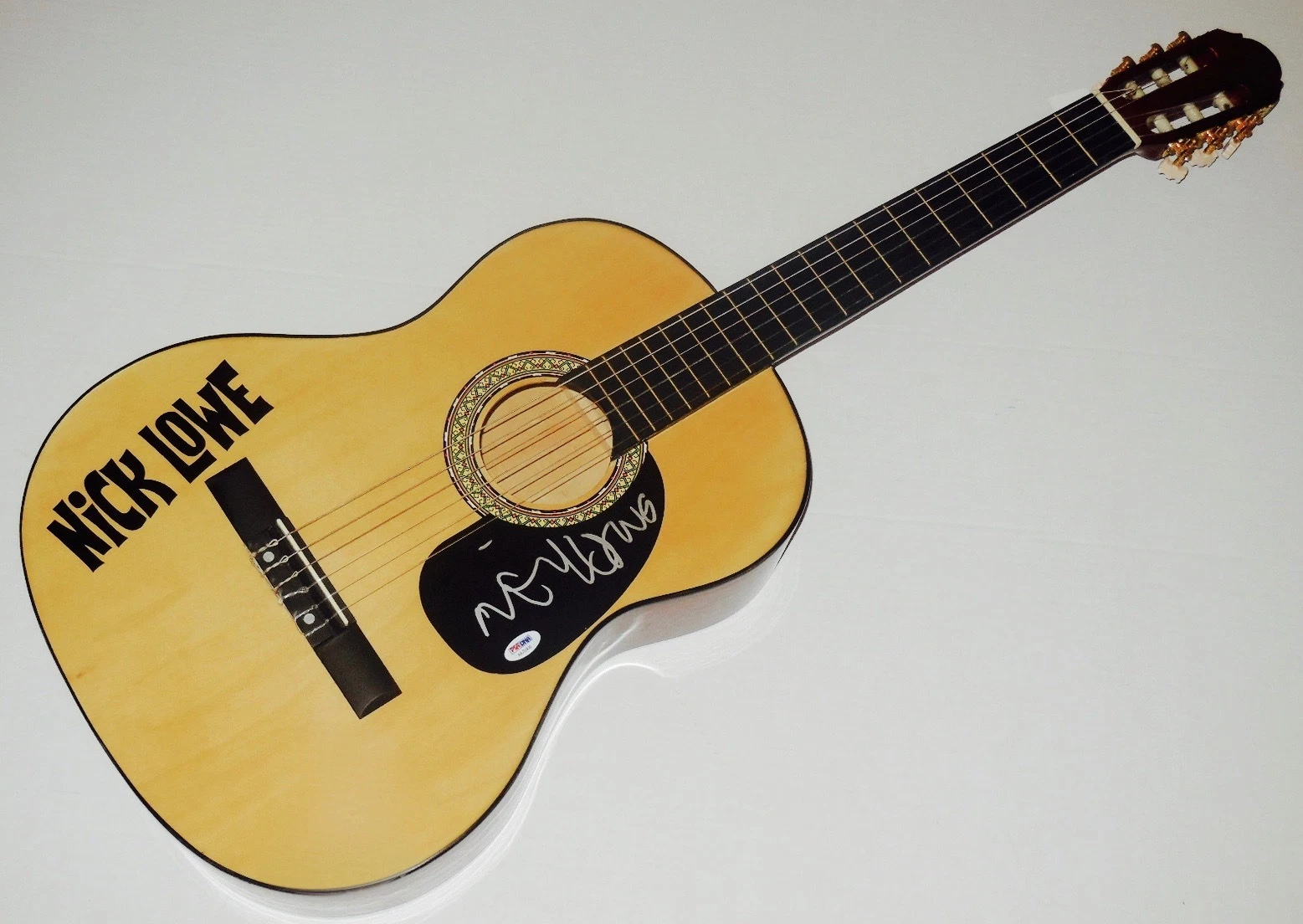 NICK LOWE AUTOGRAPHED GUITAR (CRUEL TO BE KIND) - PSA DNA!
