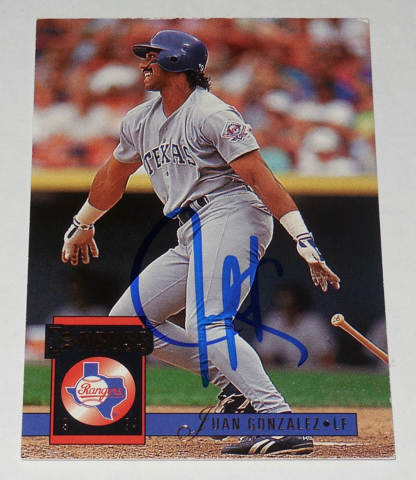 JUAN GONZALEZ 1994 DONRUSS AUTOGRAPHED BASEBALL CARD (TEXAS RANGERS)