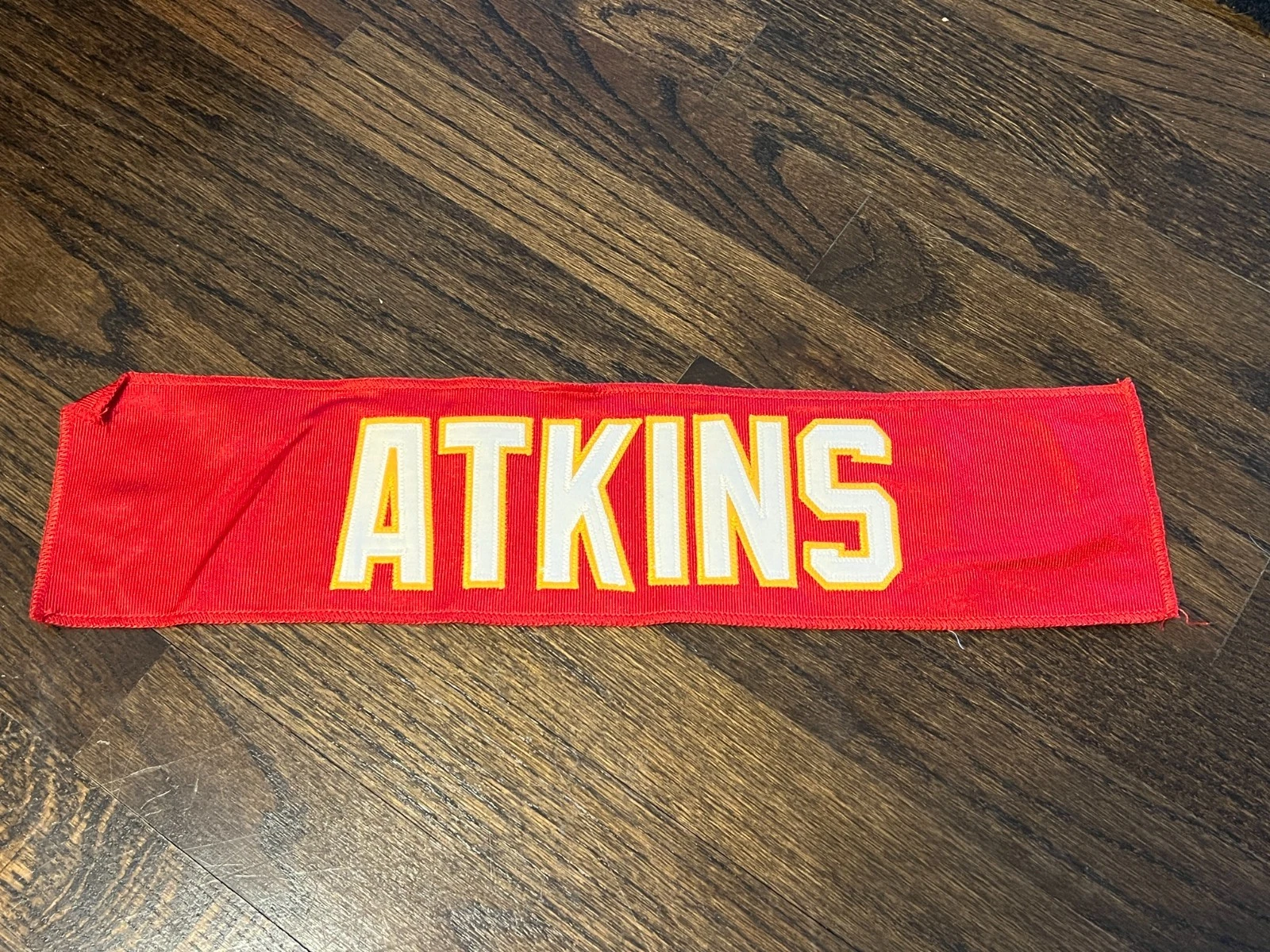 KANSAS CITY CHIEFS GAME USED ? TEAM ISSUED JERSEY NAMEPLATE LARRY ATKINS UCLA