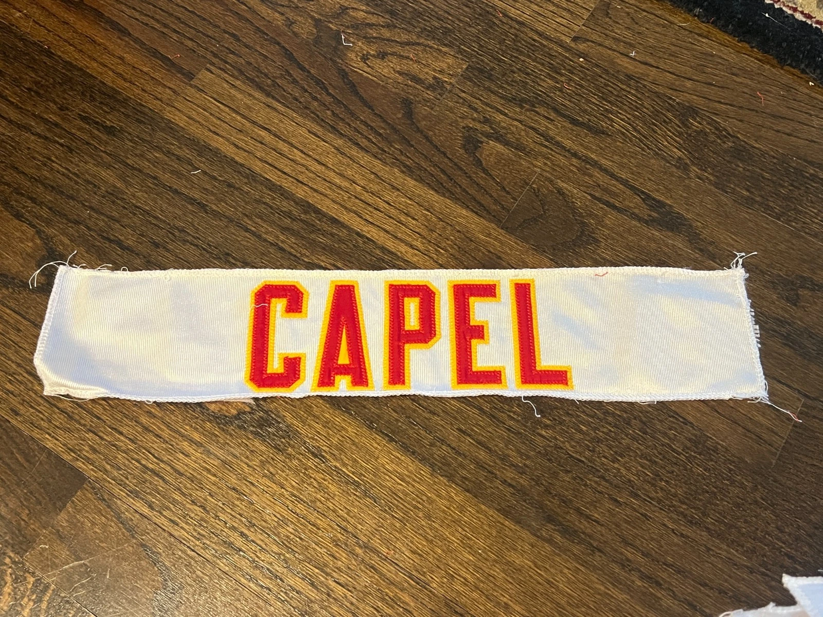KANSAS CITY CHIEFS GAME USED ? ISSUED JERSEY NAMEPLATE JOHN CAPEL JR. TRACK STAR