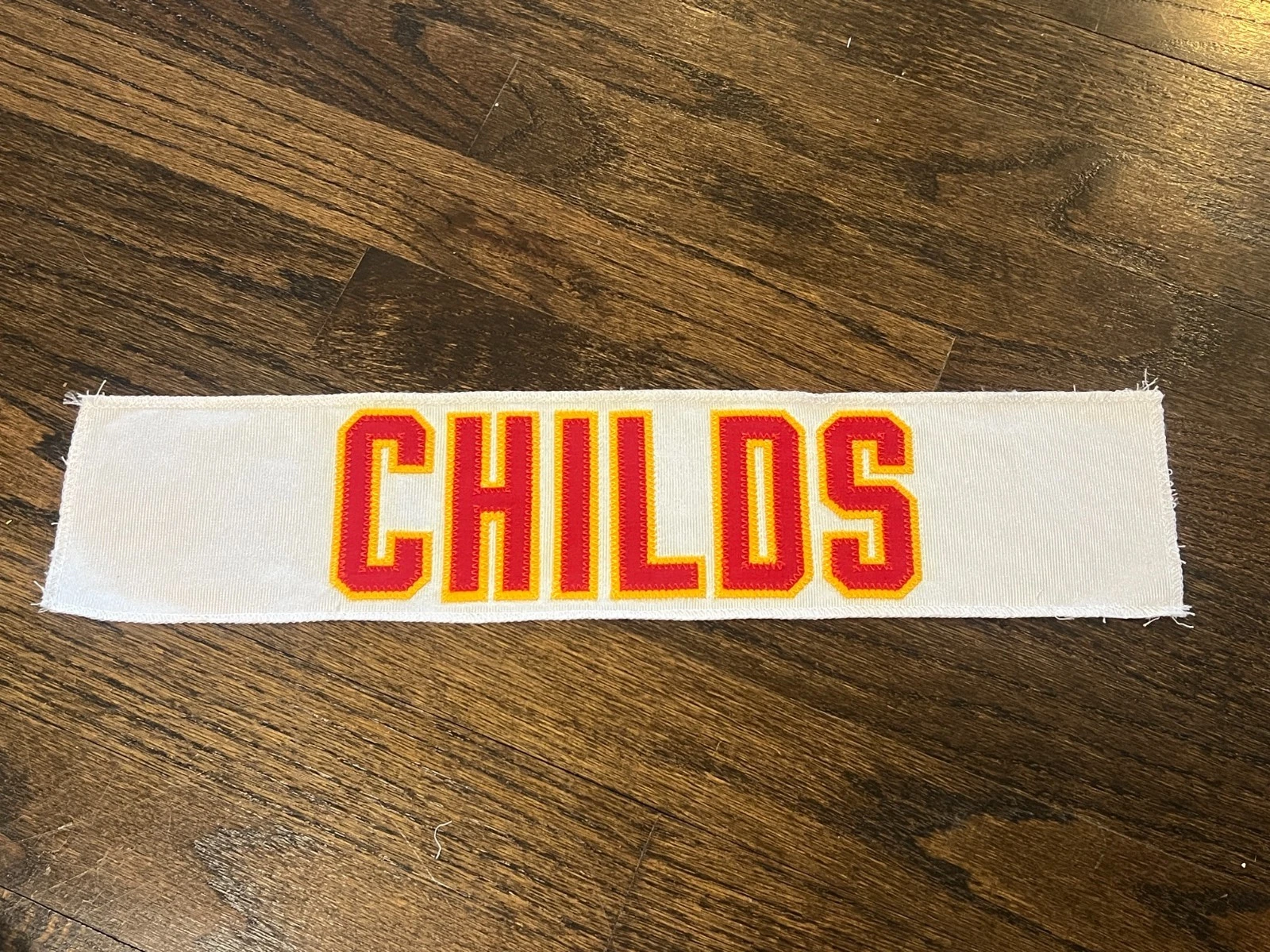 KANSAS CITY CHIEFS GAME USED ? ISSUED JERSEY NAMEPLATE NFL CHILDS FOOTBALL