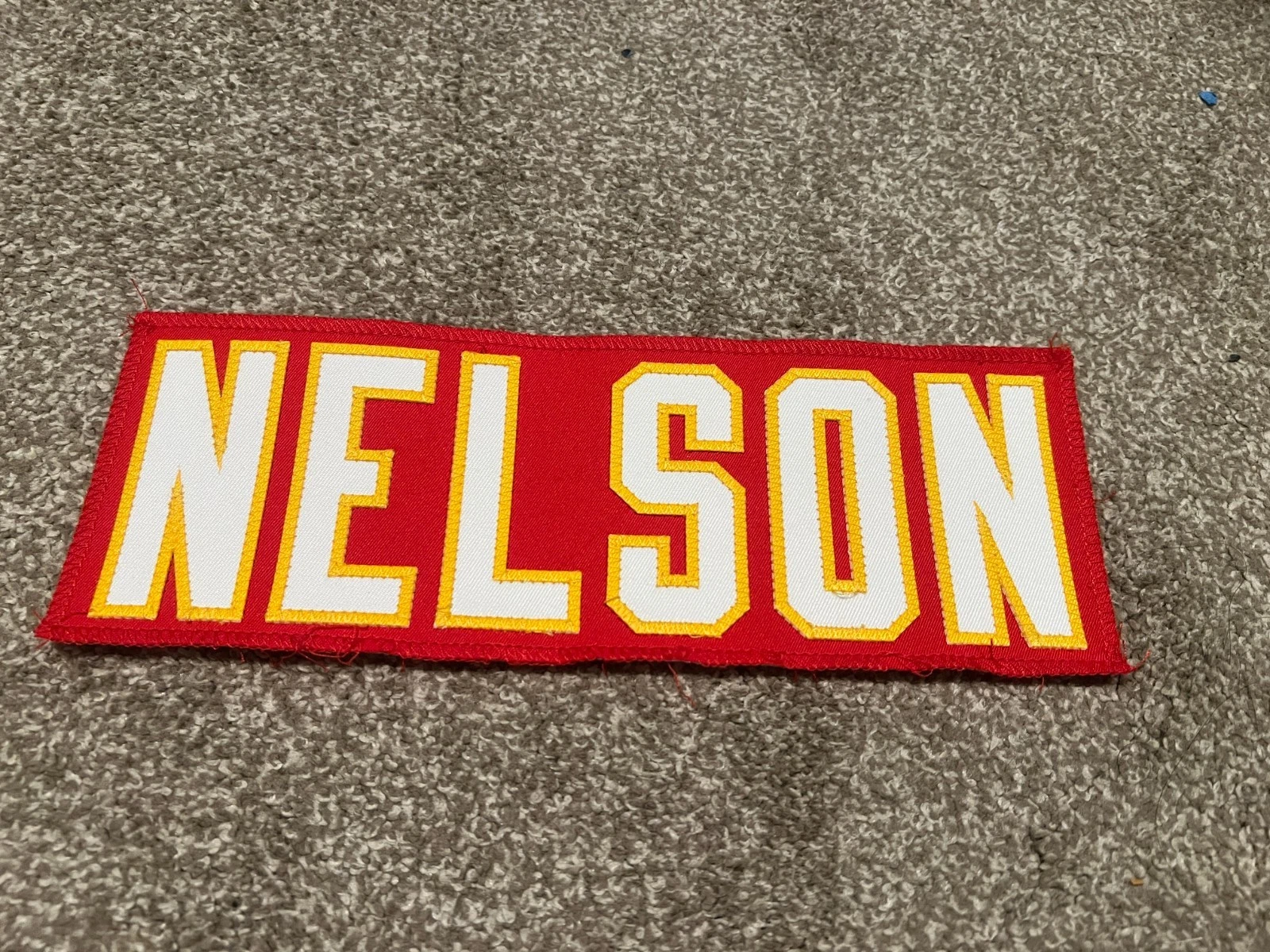 KANSAS CITY CHIEFS GAME USED ? TEAM ISSUED JERSEY NAMEPLATE TEDDY NELSON