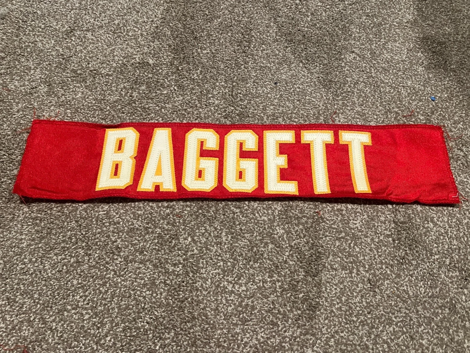 KANSAS CITY CHIEFS GAME USED ? TEAM ISSUED JERSEY NAMEPLATE FOOTBALL BAGGETT