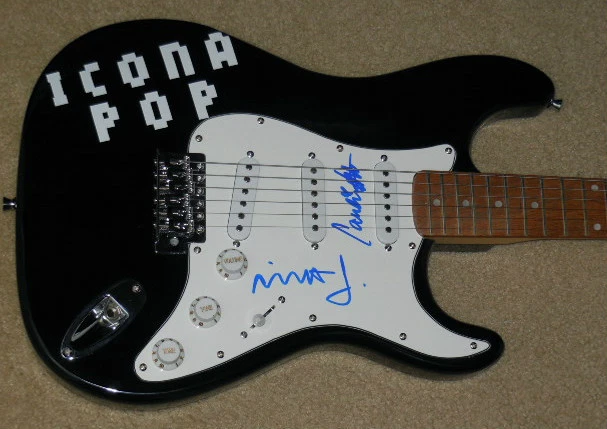 ICONA POP AUTOGRAPHED GUITAR (CAROLINE HJELT & AINO JAWO) W/ PROOF!