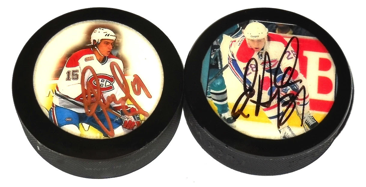 ERIC DESJARDINS & DAINIUS ZUBRUS AUTOGRAPHED HOCKEY PUCKS (MONTREAL CANADIENS)