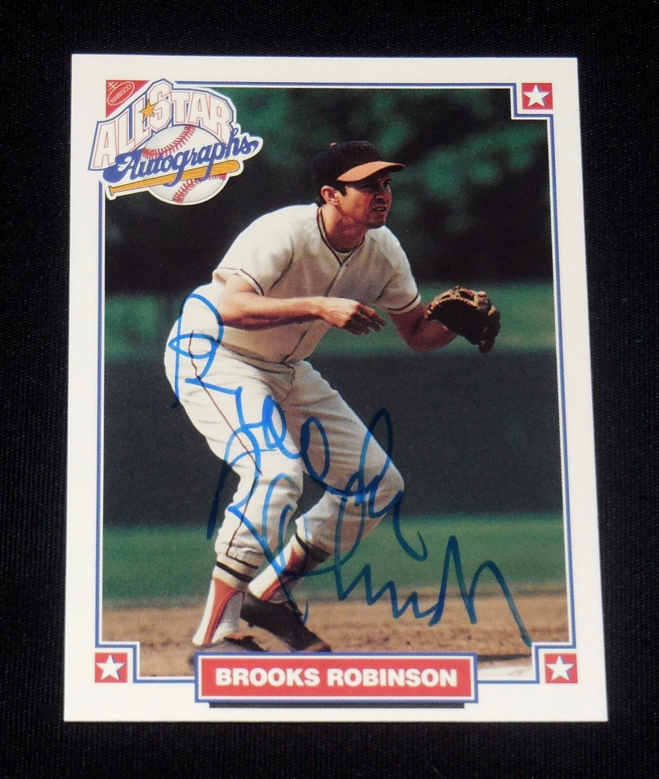 BROOKS ROBINSON AUTOGRAPHED NABISCO BASEBALL CARD (BALTIMORE ORIOLES)