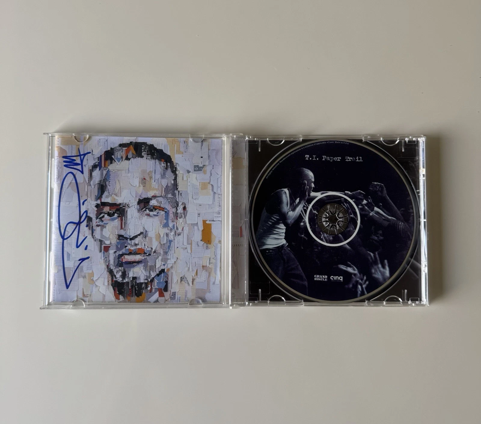 T.I. Paper Trail Autographed CD Booklet Rapper JSA COA