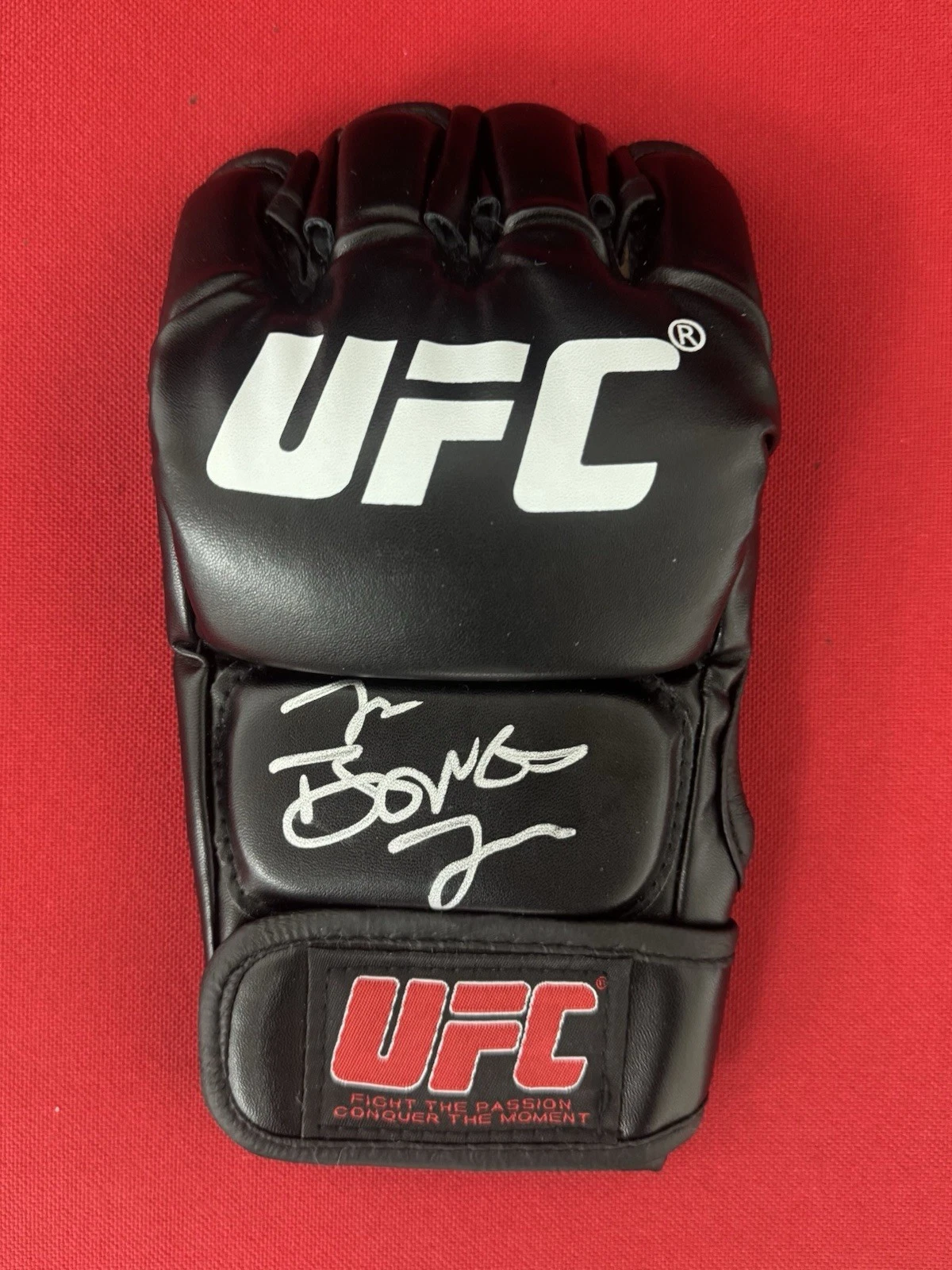 Jon “Bones” Jones Fighter Autographed UFC MMA Glove GOAT Beckett BAS COA