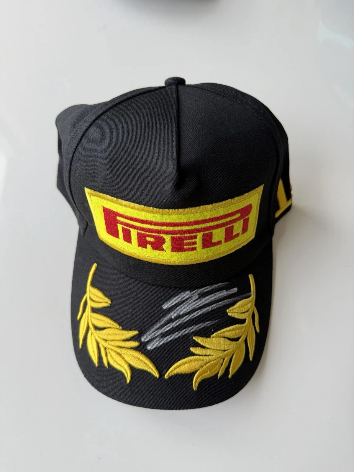 Esteban Ocon Autographed Pirelli Hat Podium Formula 1 Haas JSA COA
