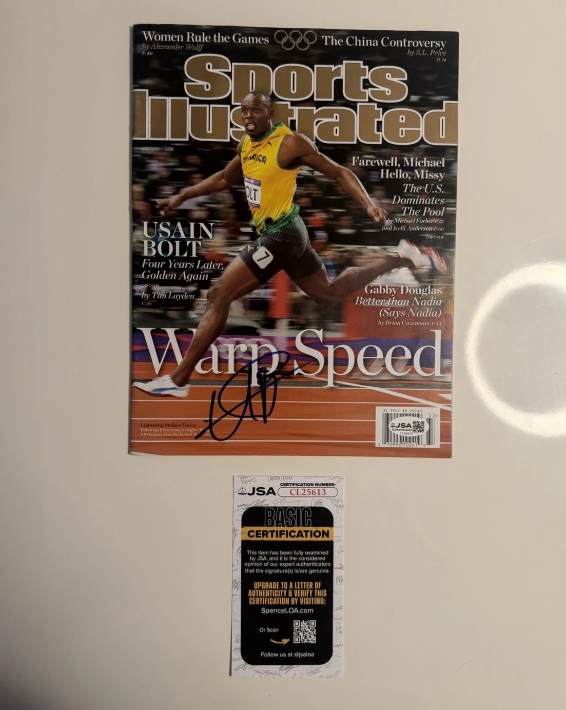 Usain Bolt Autographed Warp Speed Sports Illustrated Magazine JSA COA