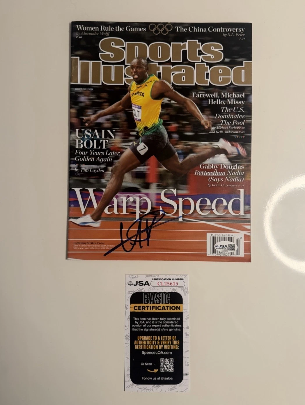 Usain Bolt Autographed Warp Speed Sports Illustrated Magazine JSA COA