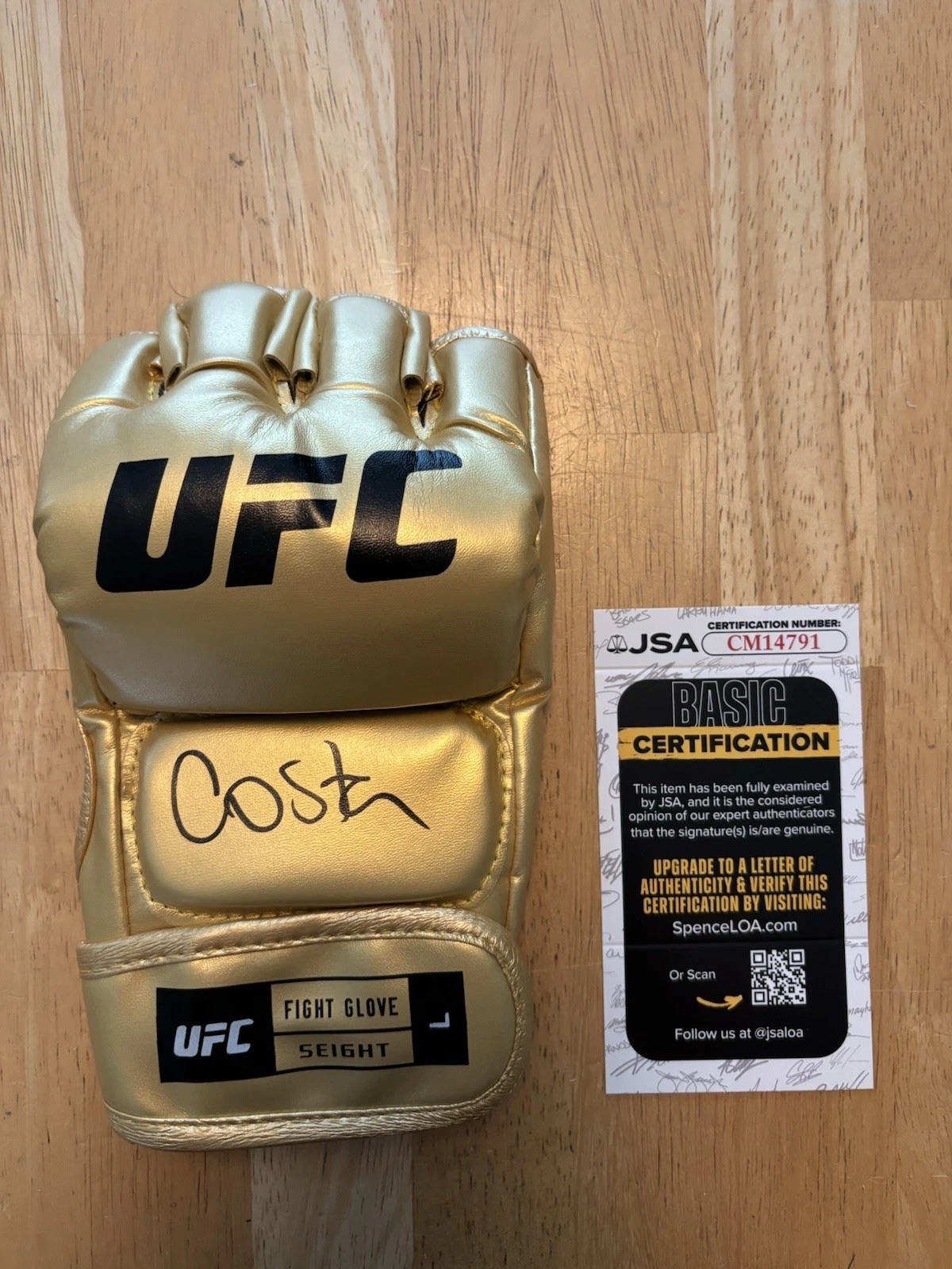 Paulo Costa Signed Autographed Gold UFC Glove. JSA Coa