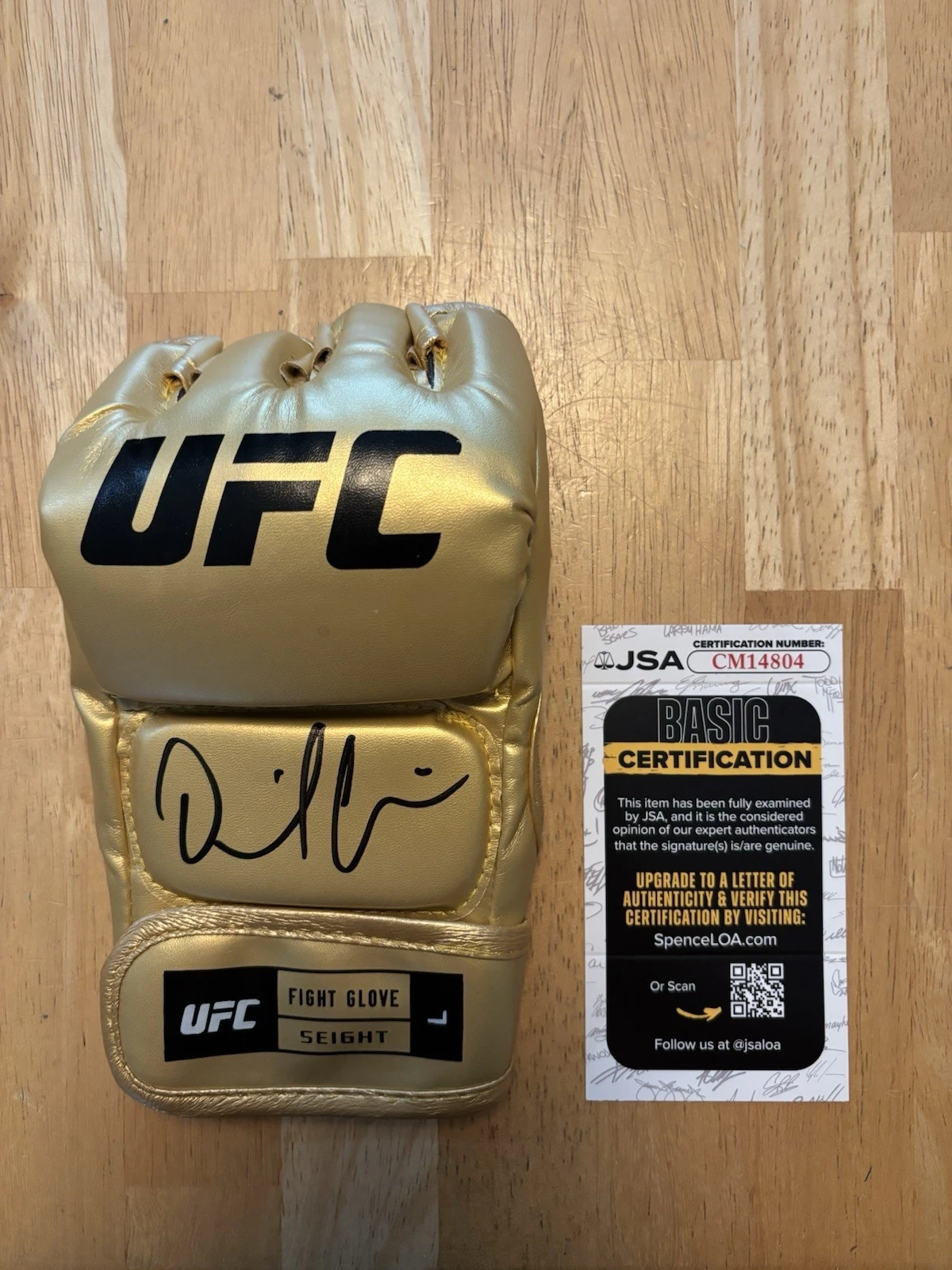 Daniel Cormier SIGNED AUTOGRAPHED UFC GLOVE MMA FIGHTER GOLD JSA