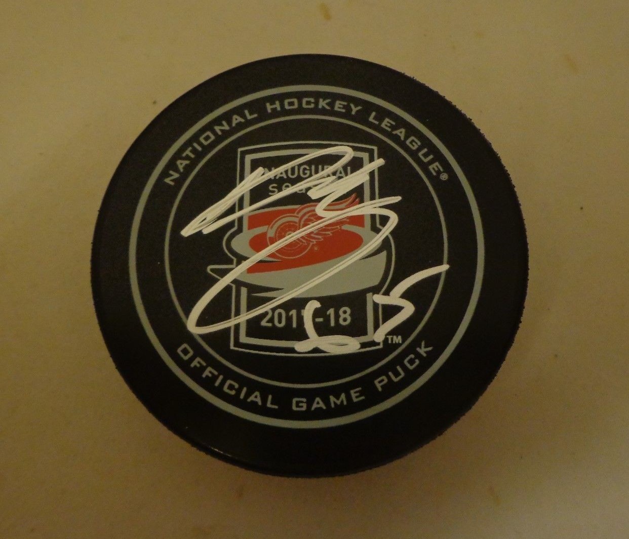 Danny Dekeyser signed Detroit Red Wings 2017 - 2018 LCA Inaugural Game Puck