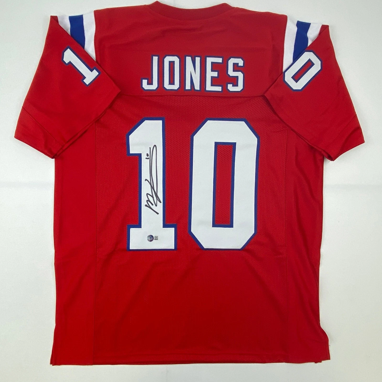 Autographed/Signed Mac Jones New England Red Jersey Beckett BAS COA