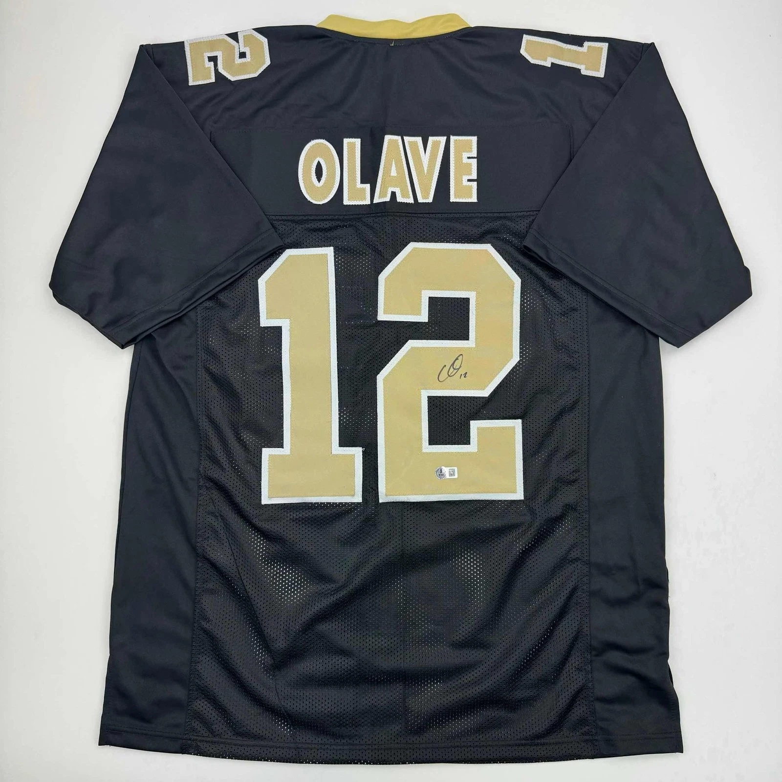 Autographed/Signed Chris Olave New Orleans Black Jersey Beckett BAS COA