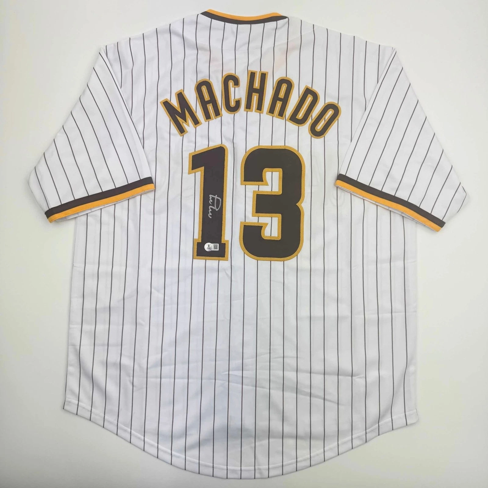 Autographed/Signed MANNY MACHADO San Diego Pinstripe Jersey Beckett COA