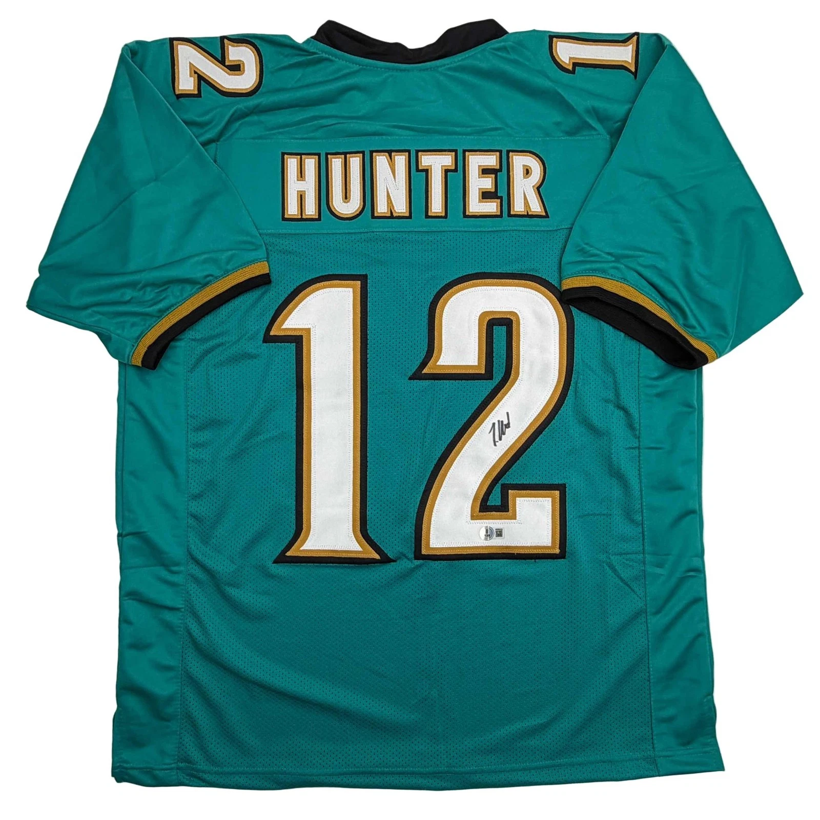Autographed/Signed Travis Hunter Jacksonville Teal Retro Jersey Beckett COA