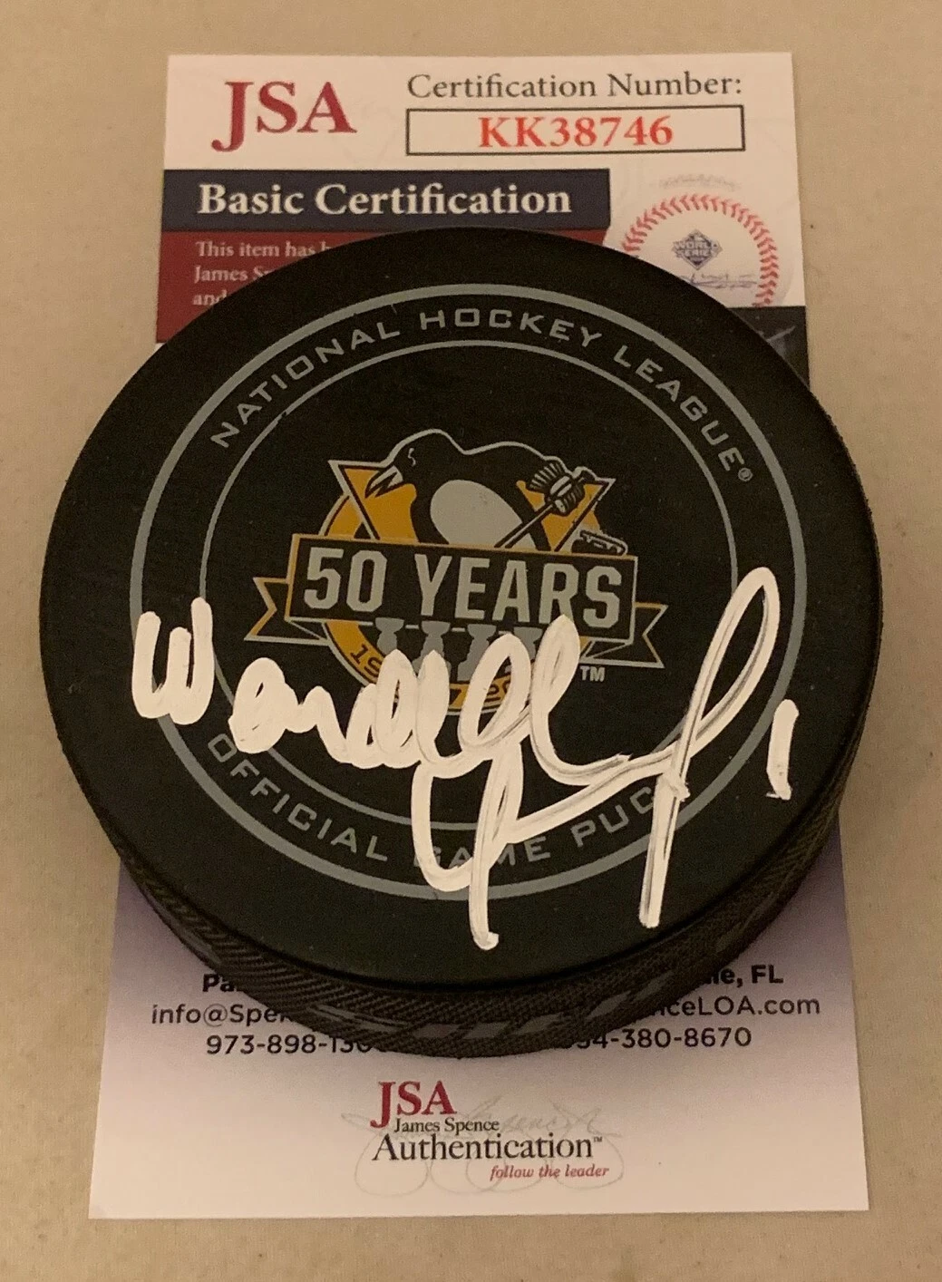 Wendell Young signed Pittsburgh Penguins 50th Anniversary Game Puck JSA